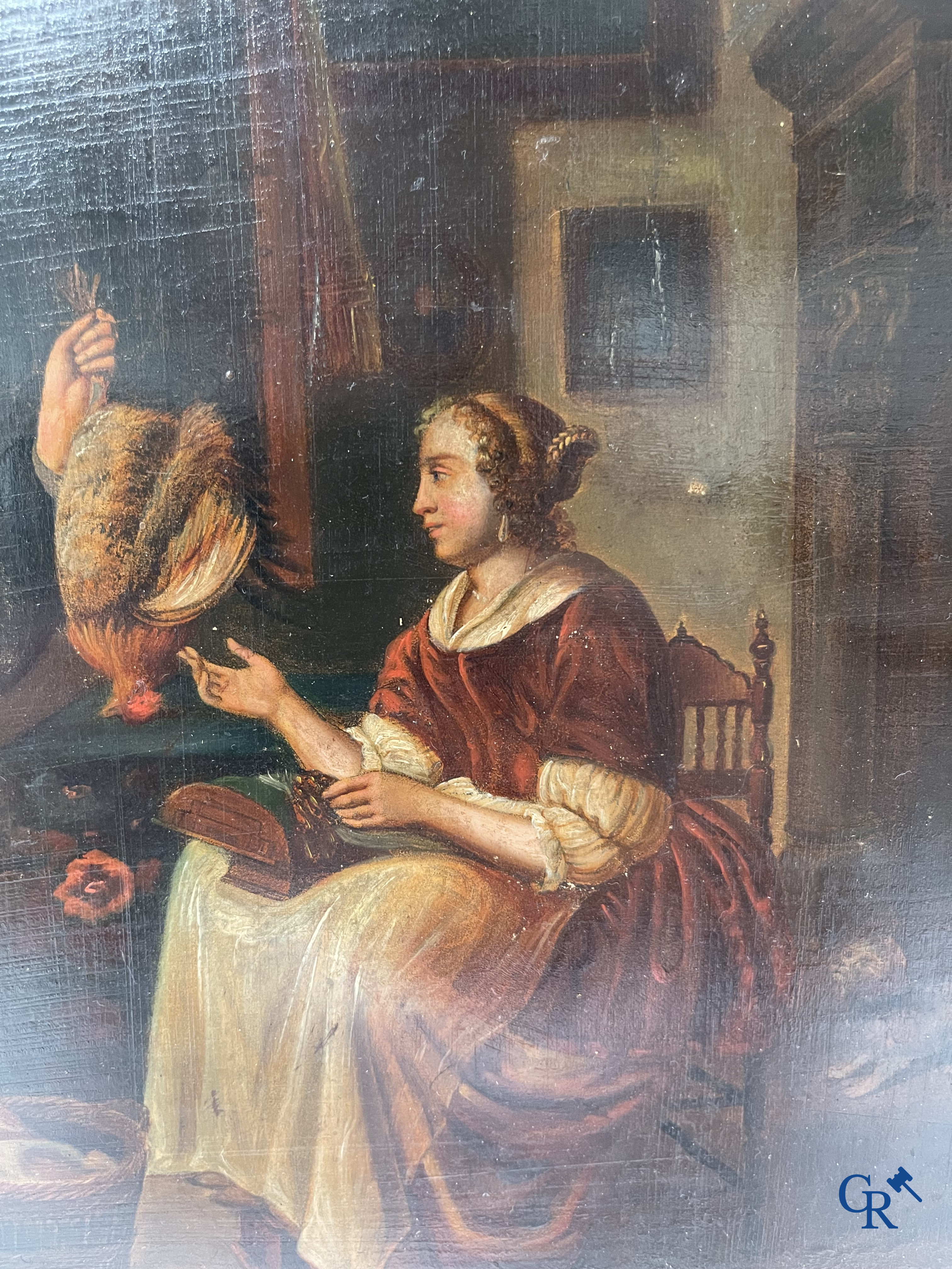 École flamande, scène d'intérieur avec un éleveur de poulet, huile sur métal.