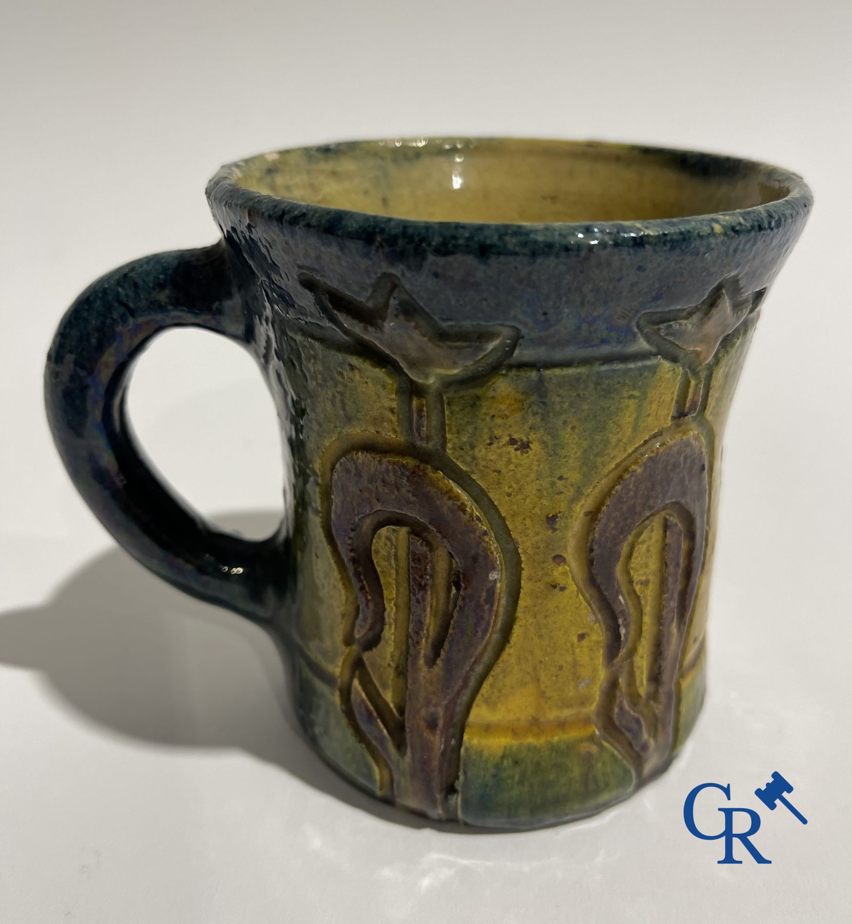 A Torhout tobacco pot Armand Maes-Platteau and a mug in Flemish pottery.