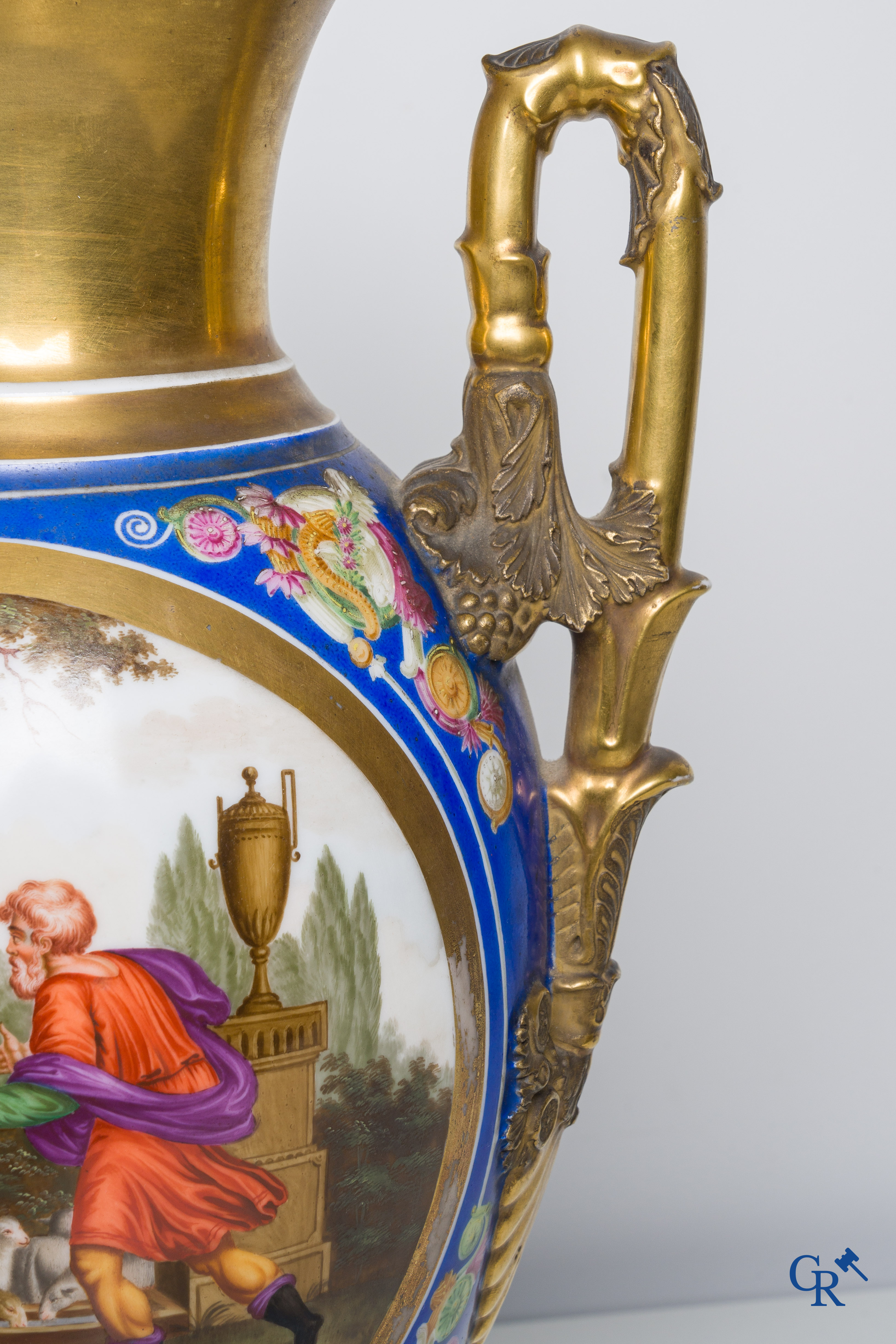 Empire, a pair of imposing multicolored decorated and gilded vases. Early 19th century.