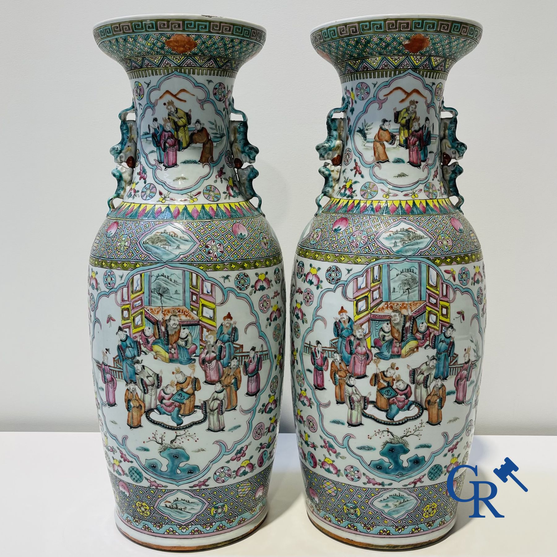 Asian art: Chinese porcelain, a pair of Chinese famille rose vases with court scenes. 19th century.