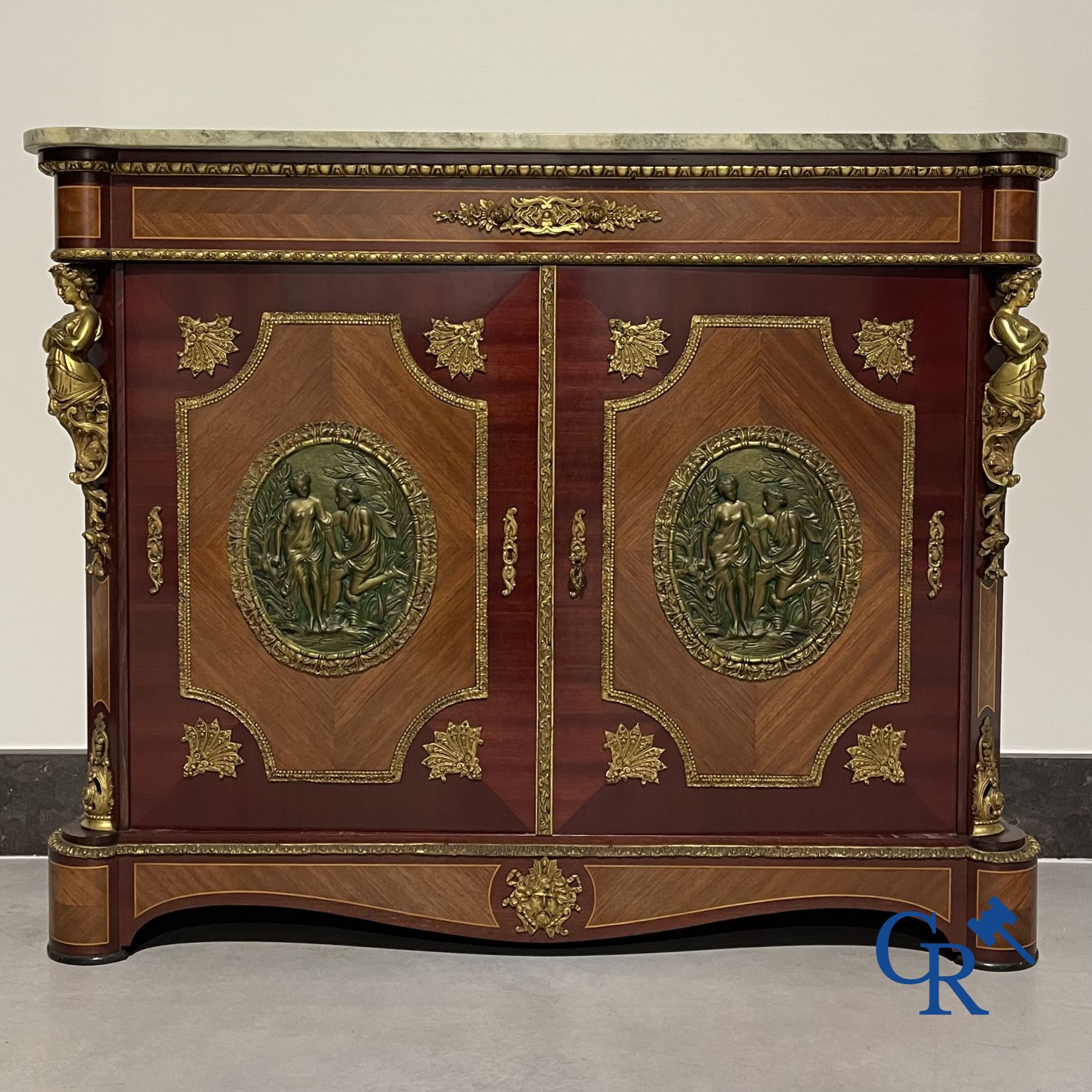 2-doors cabinet in LVI style with bronze fittings and a marble top.