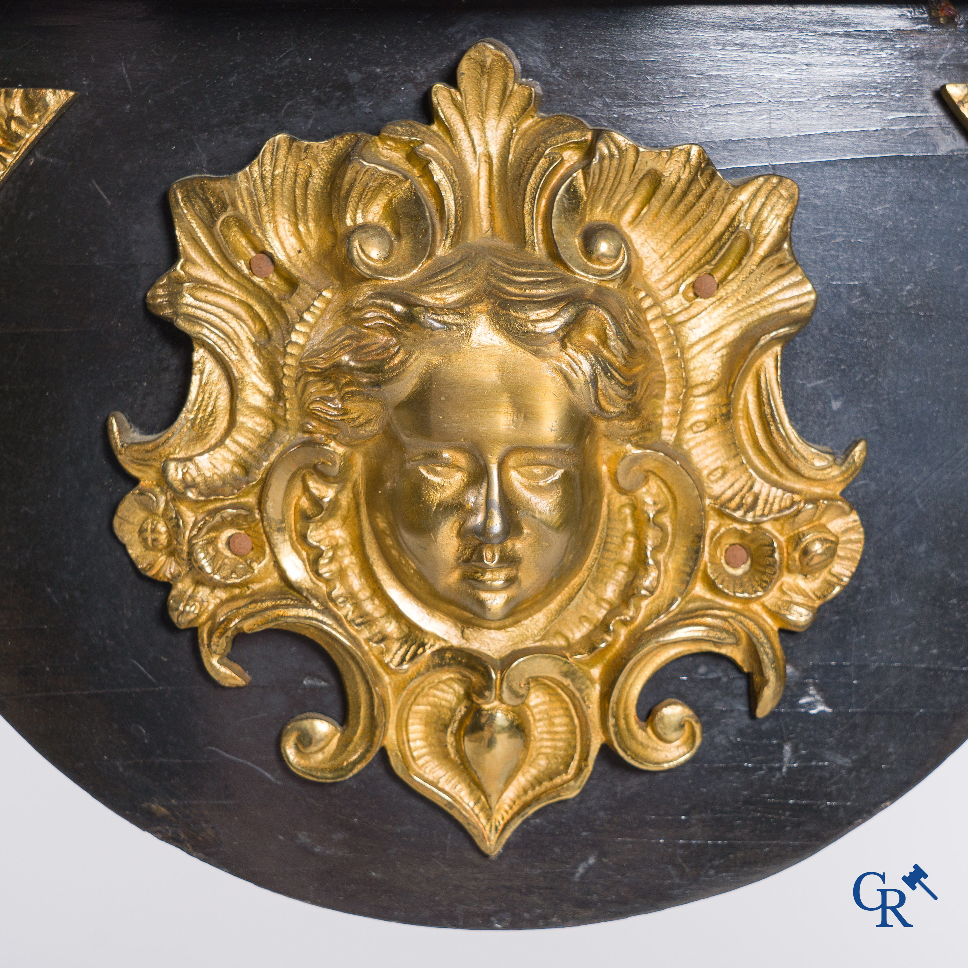 A card table with finely gilded bronze ornaments and inlay of copper and mother-of-pearl, circa 1880.