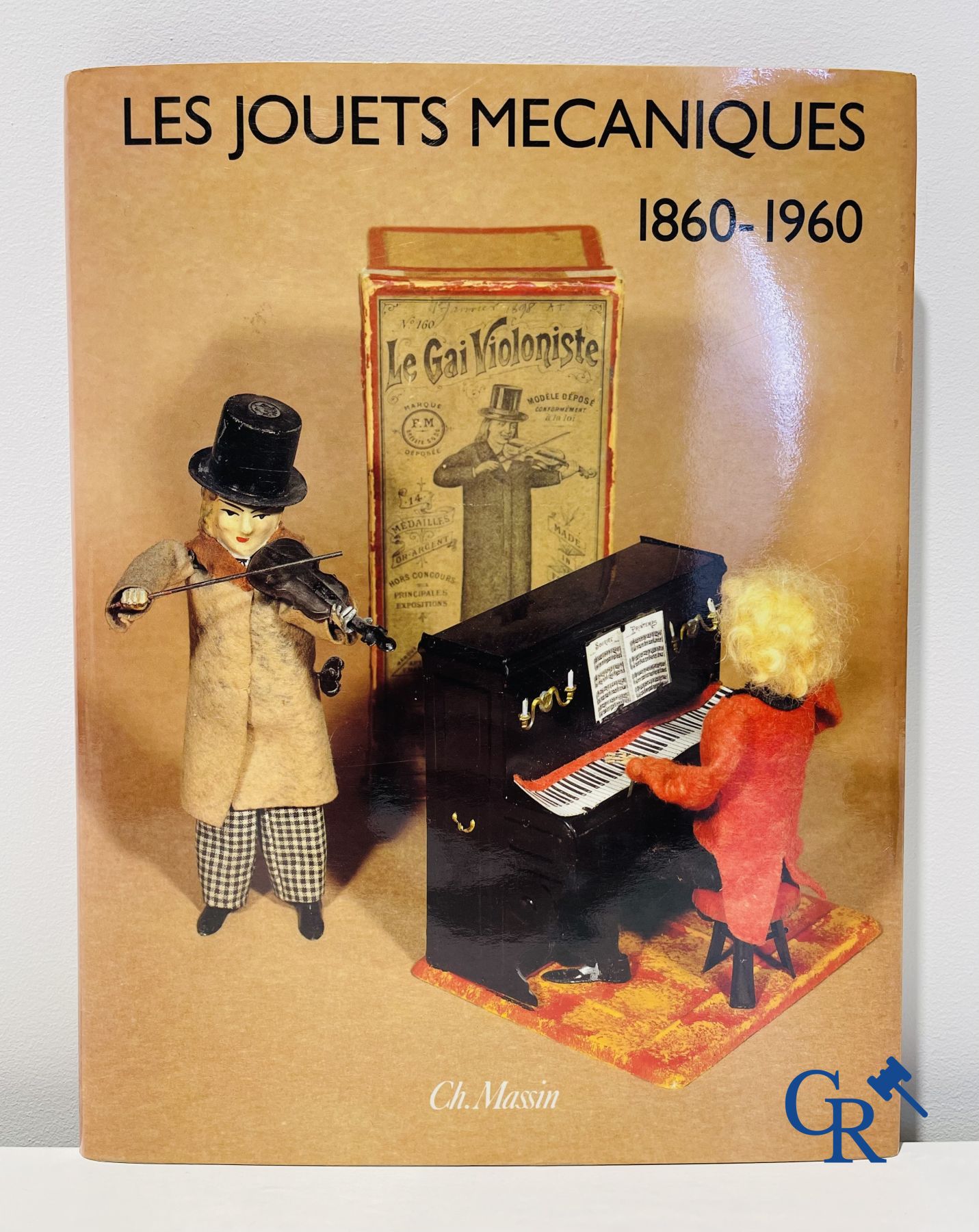 Jouets anciens : Un lot avec 13 livres sur les jouets anciens.