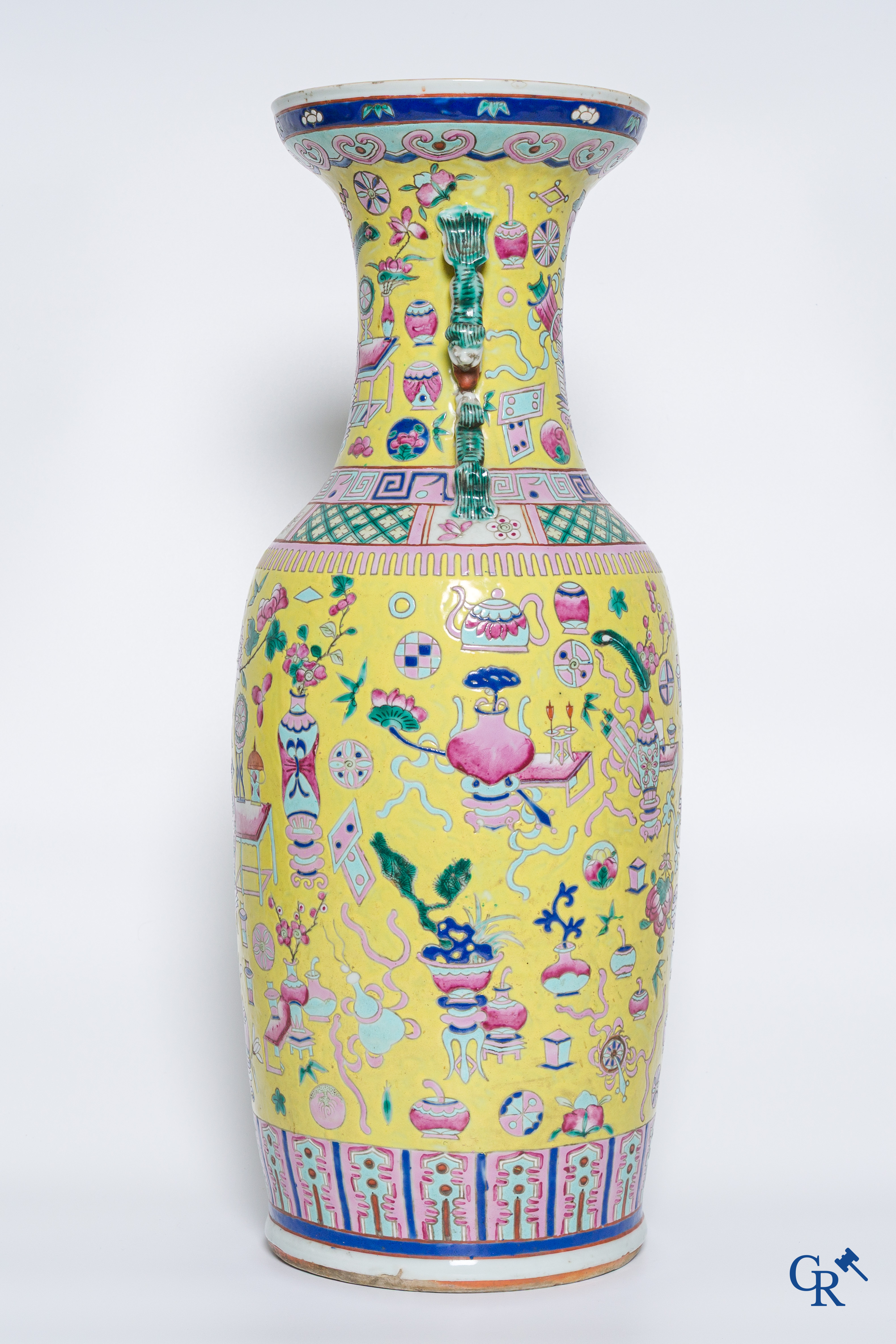 Asian Art, Chinese porcelain, a large Chinese famille jaune and rose vase with a decor of antiques. 19th century.