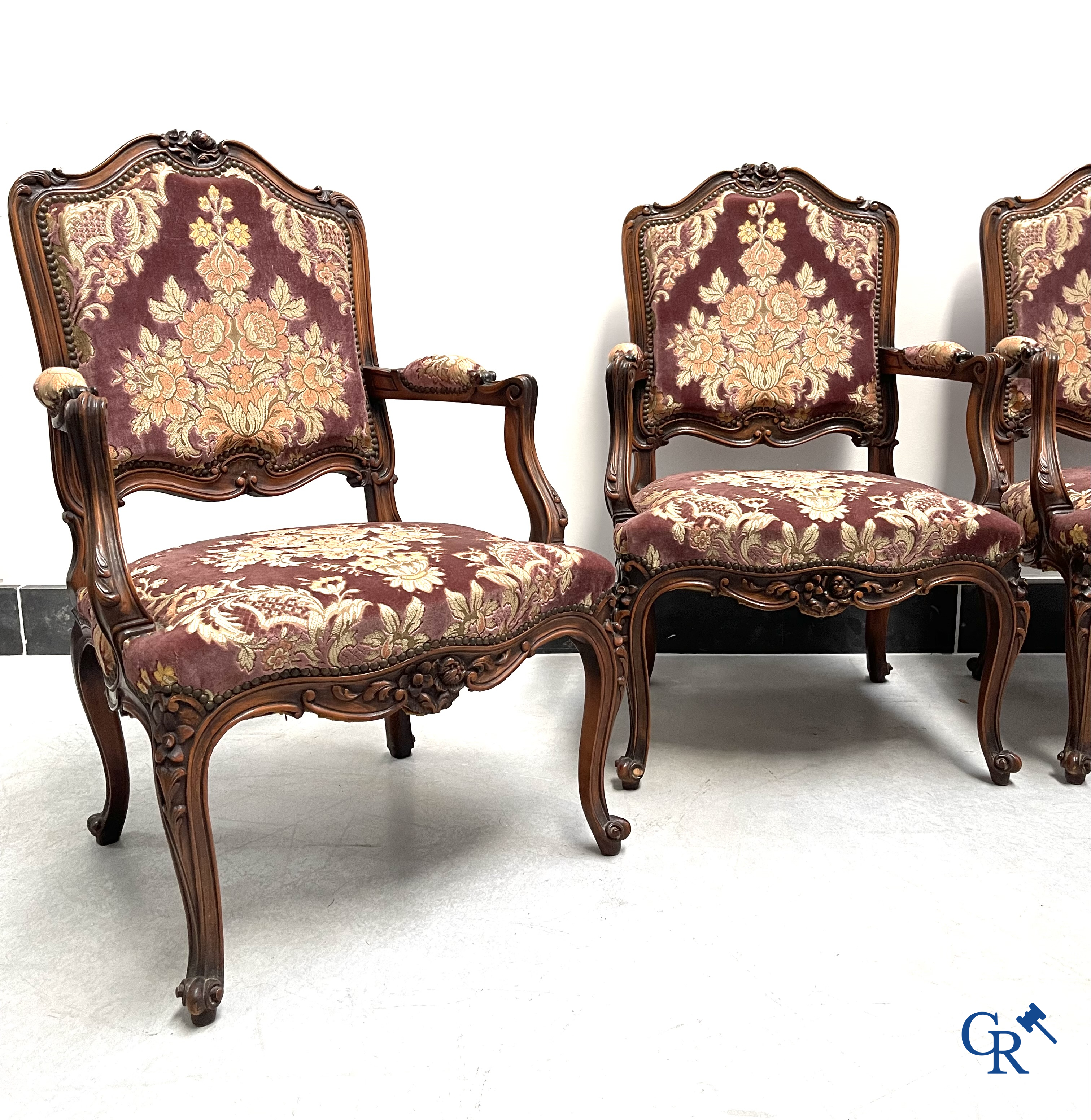 A set of 4 carved wood LXV-style armchairs.