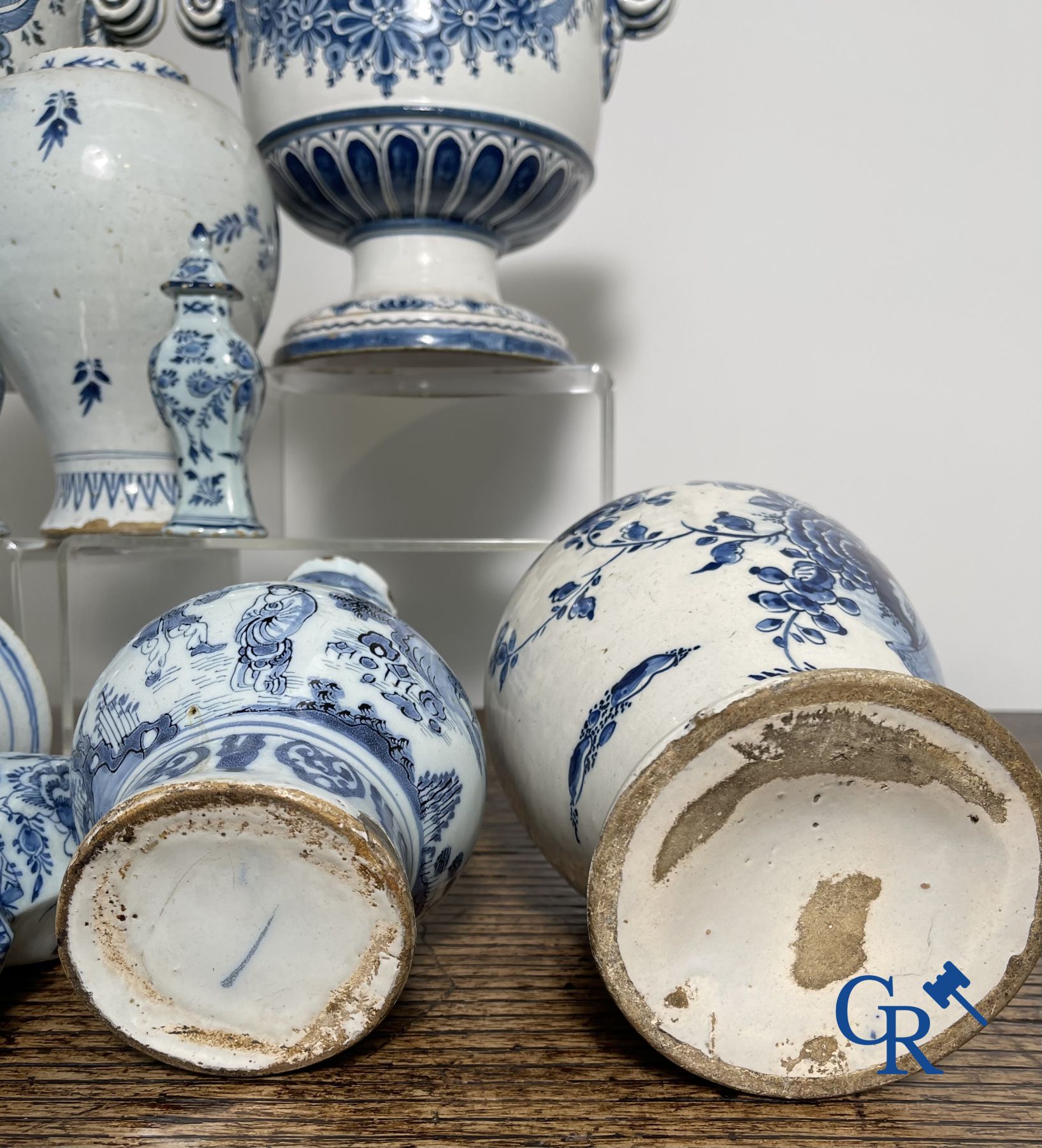 Delft: 11 pieces of blue and white faience with different décors. 17th - 18th century.