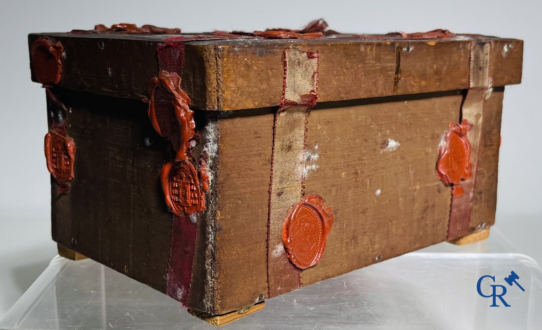 An antique wooden reliquary sealed with wax seals. Early 19th century.