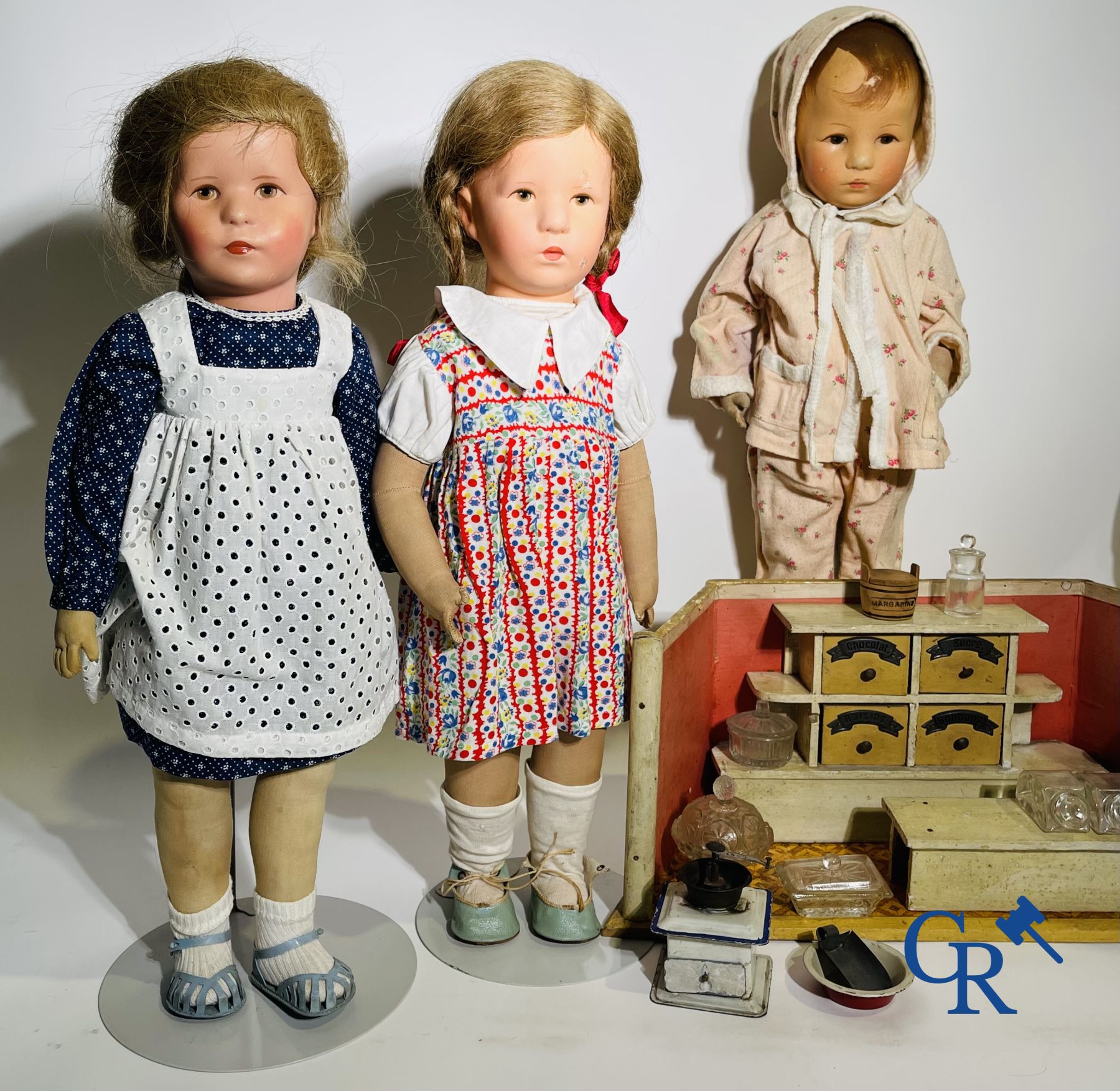 Toys: antique dolls: a lot of 6 dolls with a miniature grocery store attached.