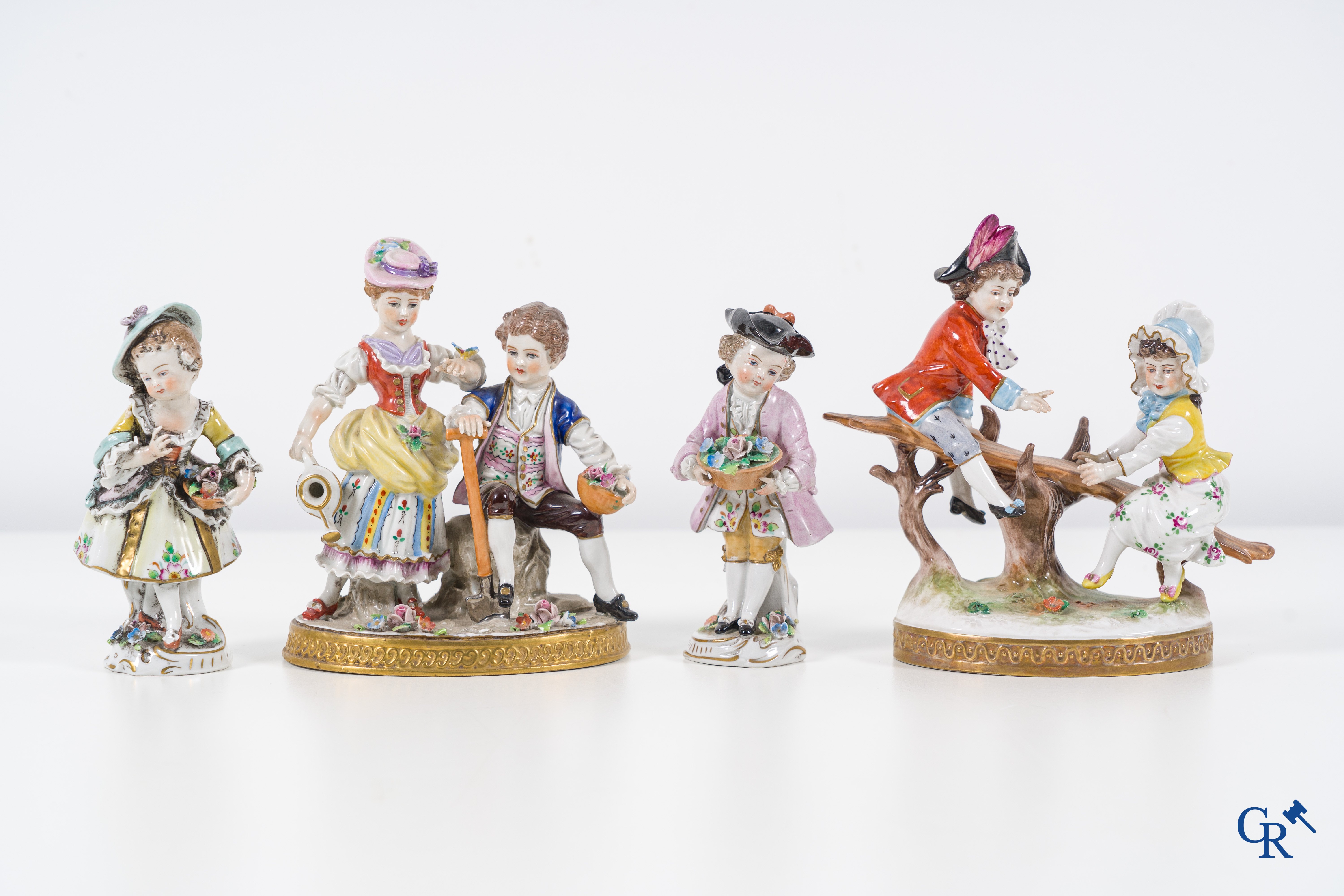 European porcelain: Volkstedt Rudolstadt and Sitzendorf porcelain. 4 groups in multi-coloured finely decorated porcelain.