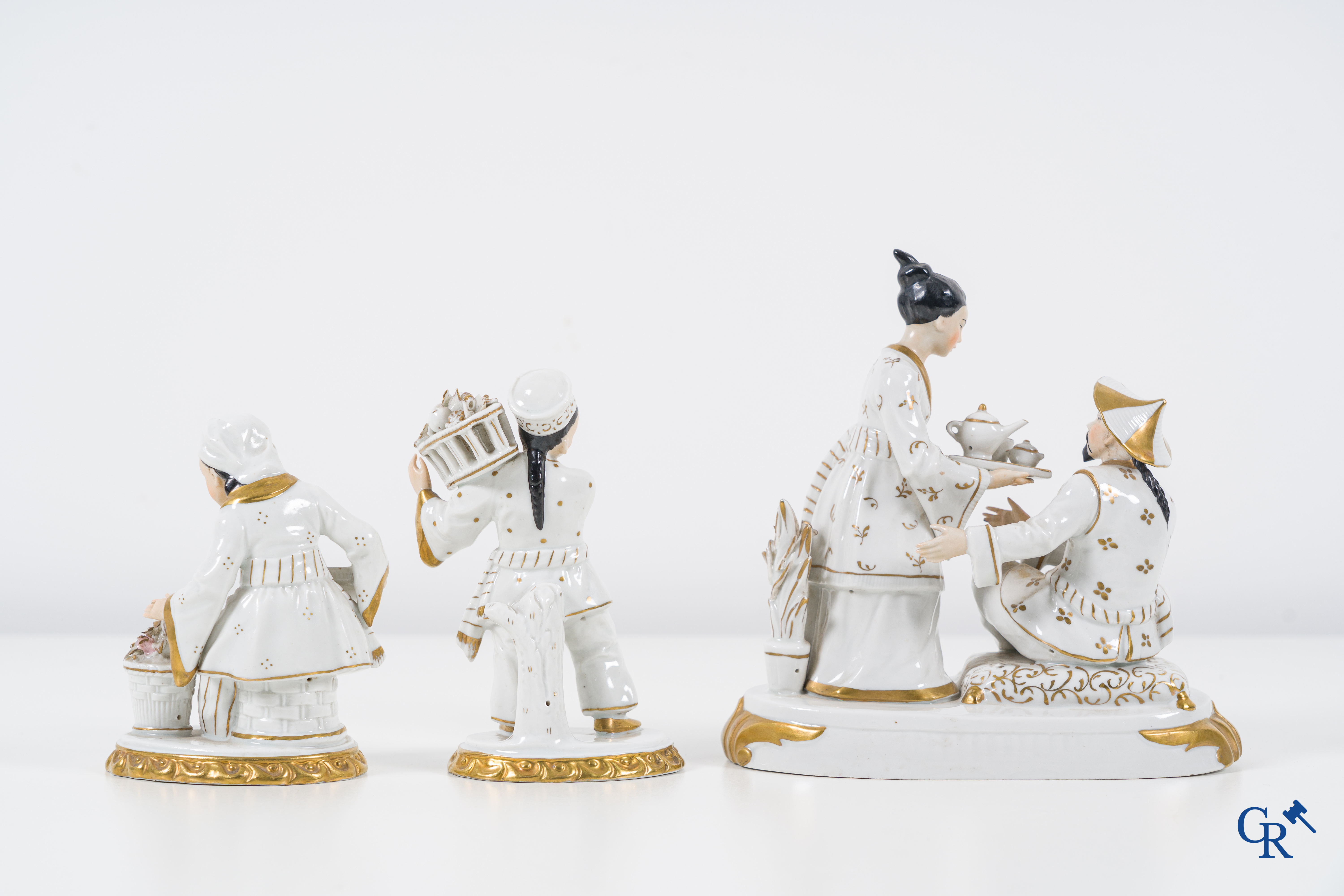 European porcelain: Sitzendorf, 3 groups in fine Sitzendorf porcelain with Asian representations.