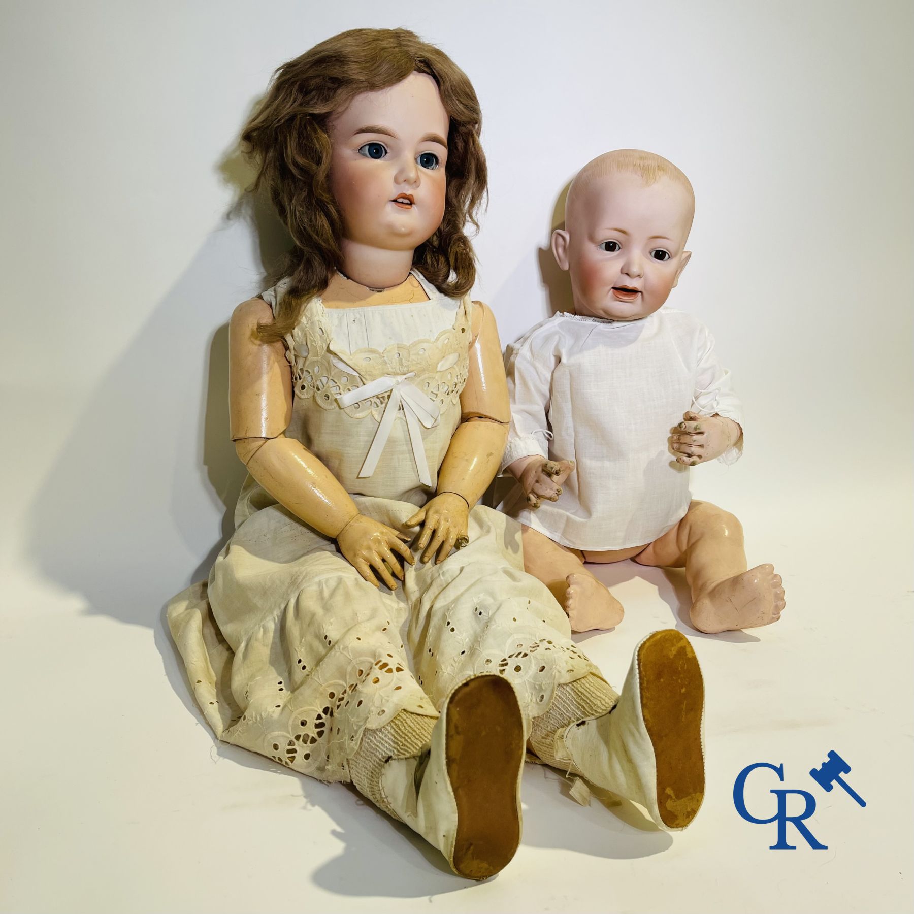 Toys: antique dolls: a lot of 2 antique dolls with porcelain heads.