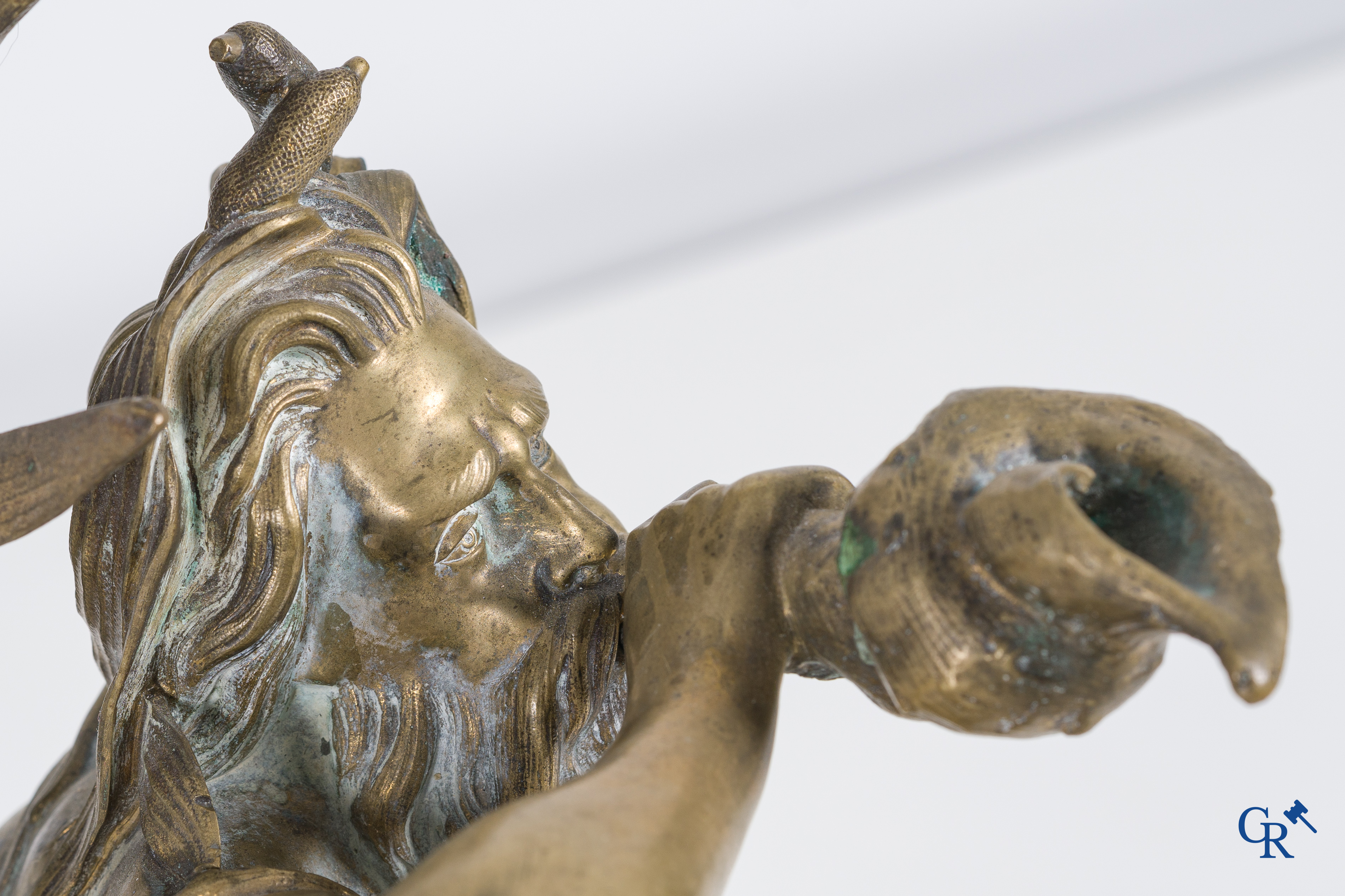 A large pair of finely chiseled bronze chenets with Tritons. Louis XV style. Napoleon III period.