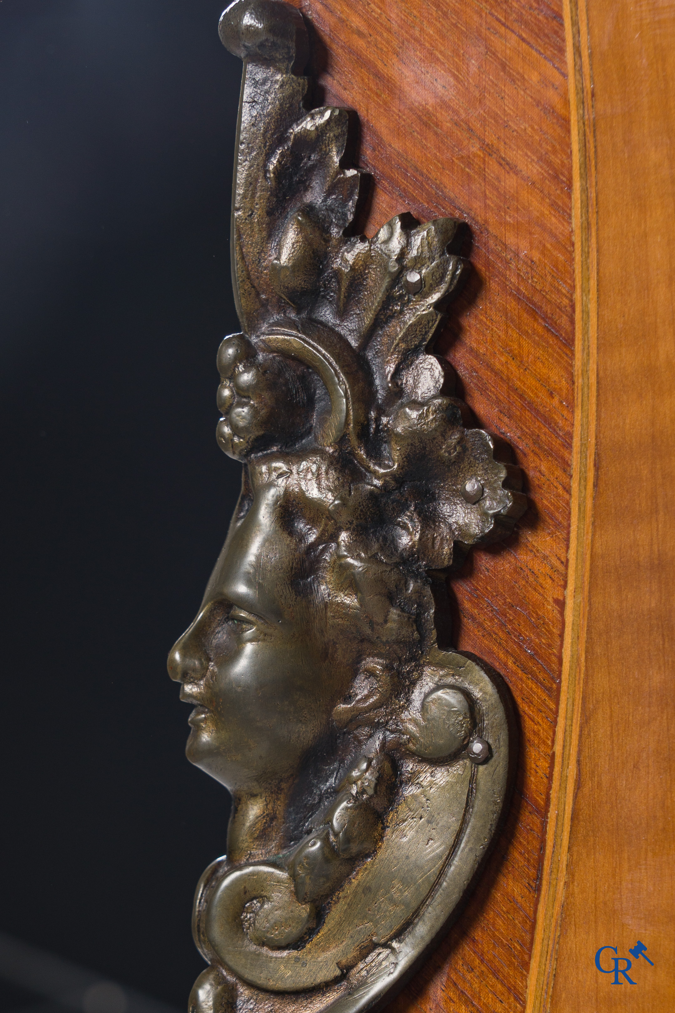 A marquetry chest of drawers and bronze fittings with a marble tablet. LXV style.