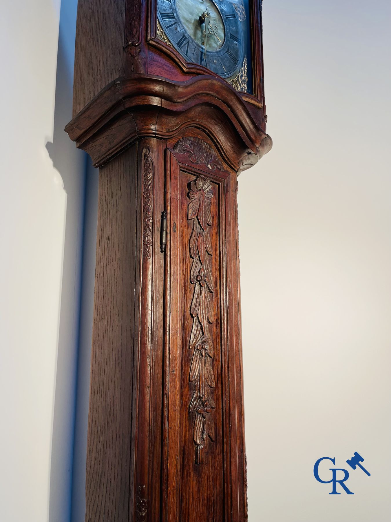 Standing clock in oak. 18th century.