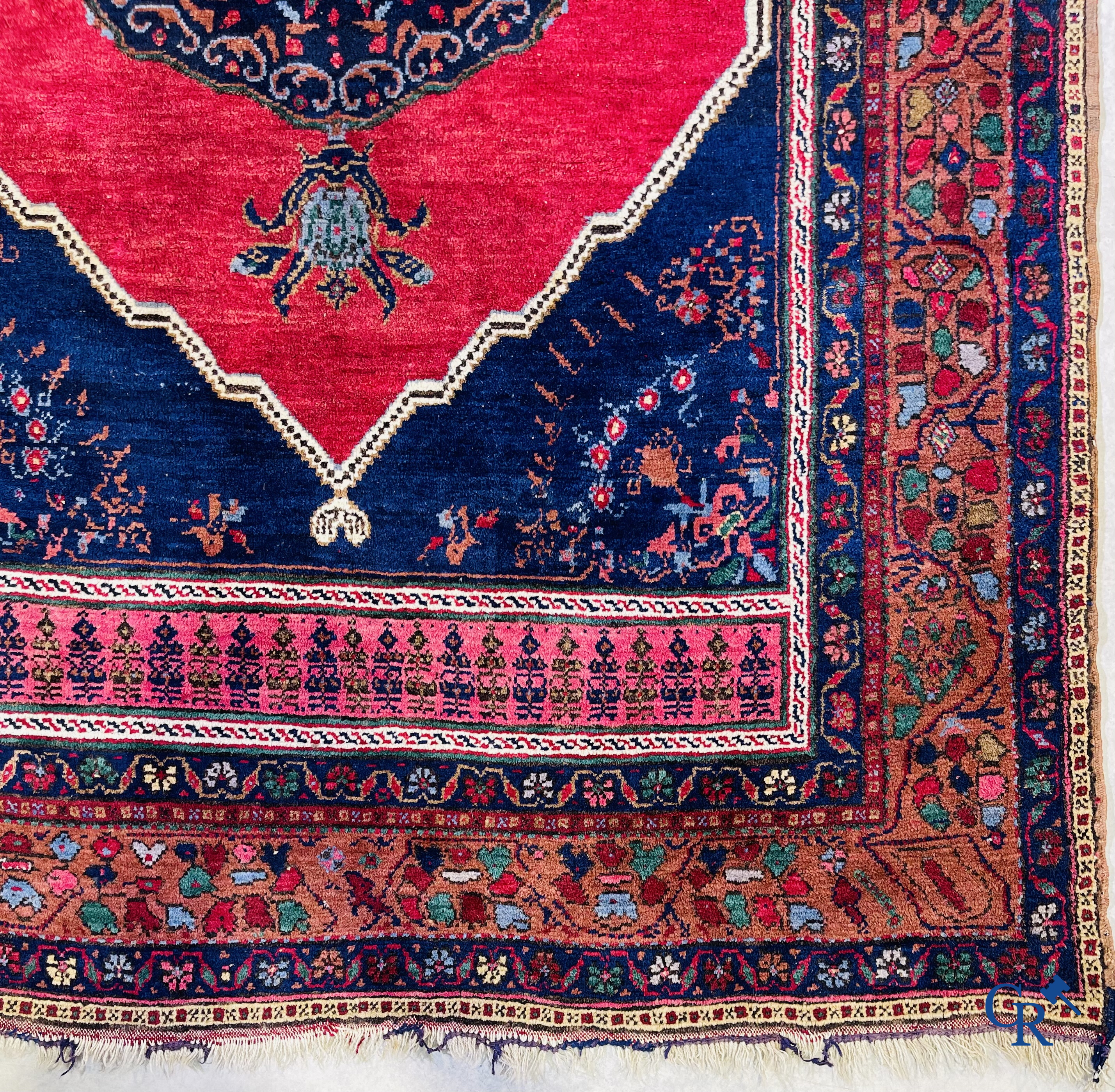 Oriental carpets, 2 antique hand-knotted Oriental carpets.