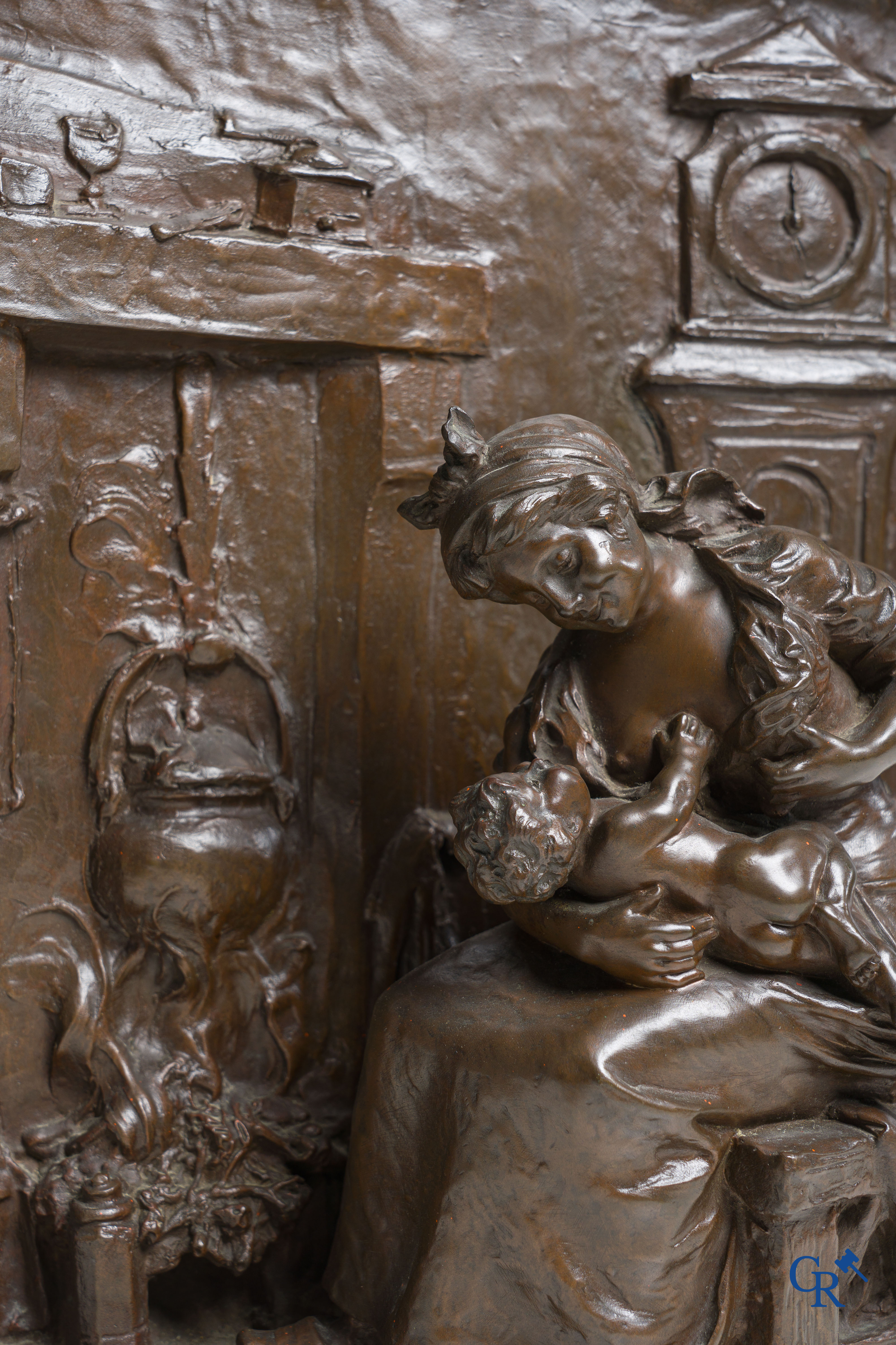 Barrias Louis Ernest (Paris 1841-1905) Bronze bas-relief, mother with child by the fireplace.