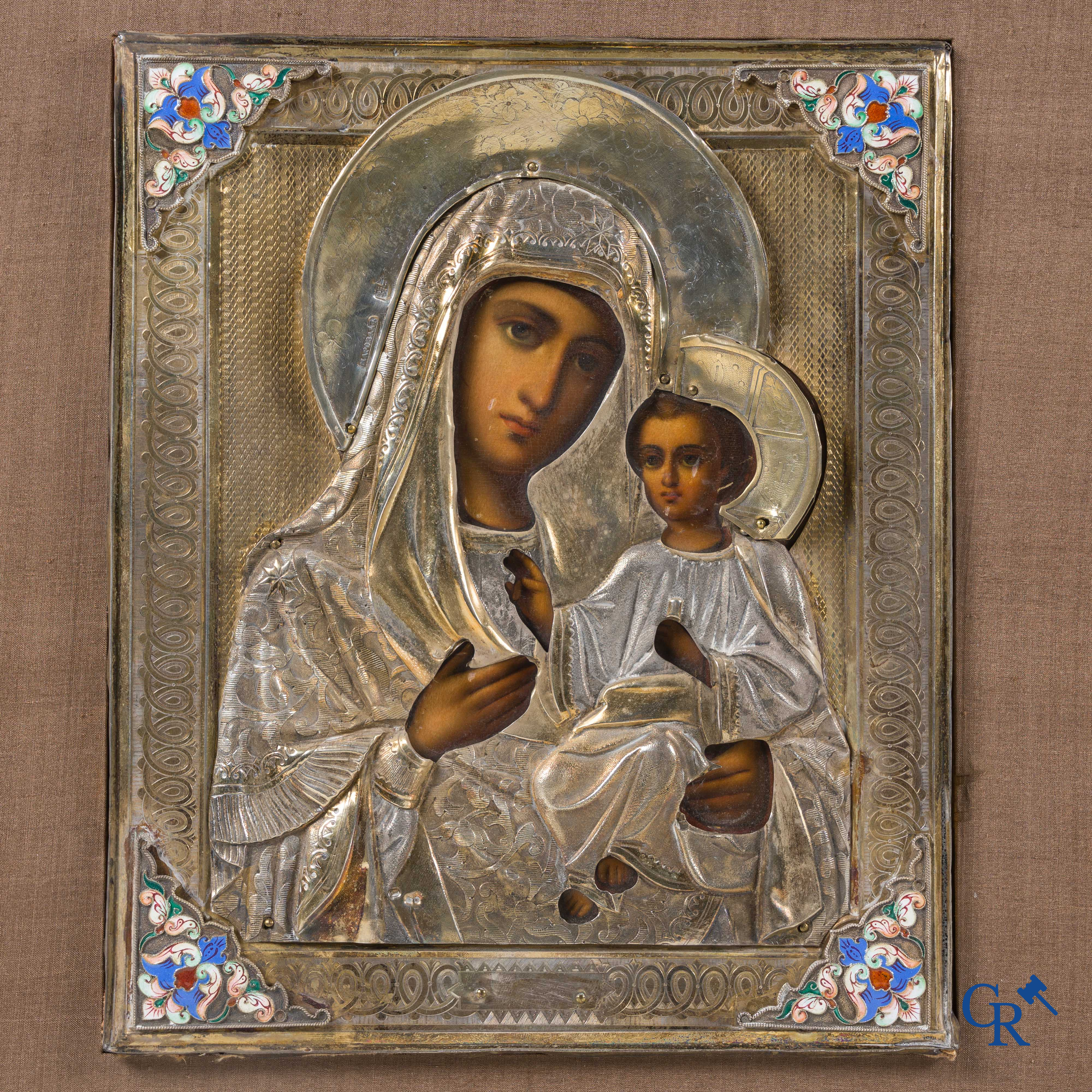 Icon, Russian work, an icon with a silver and enameled oklad. Marked 84 zolotnik.