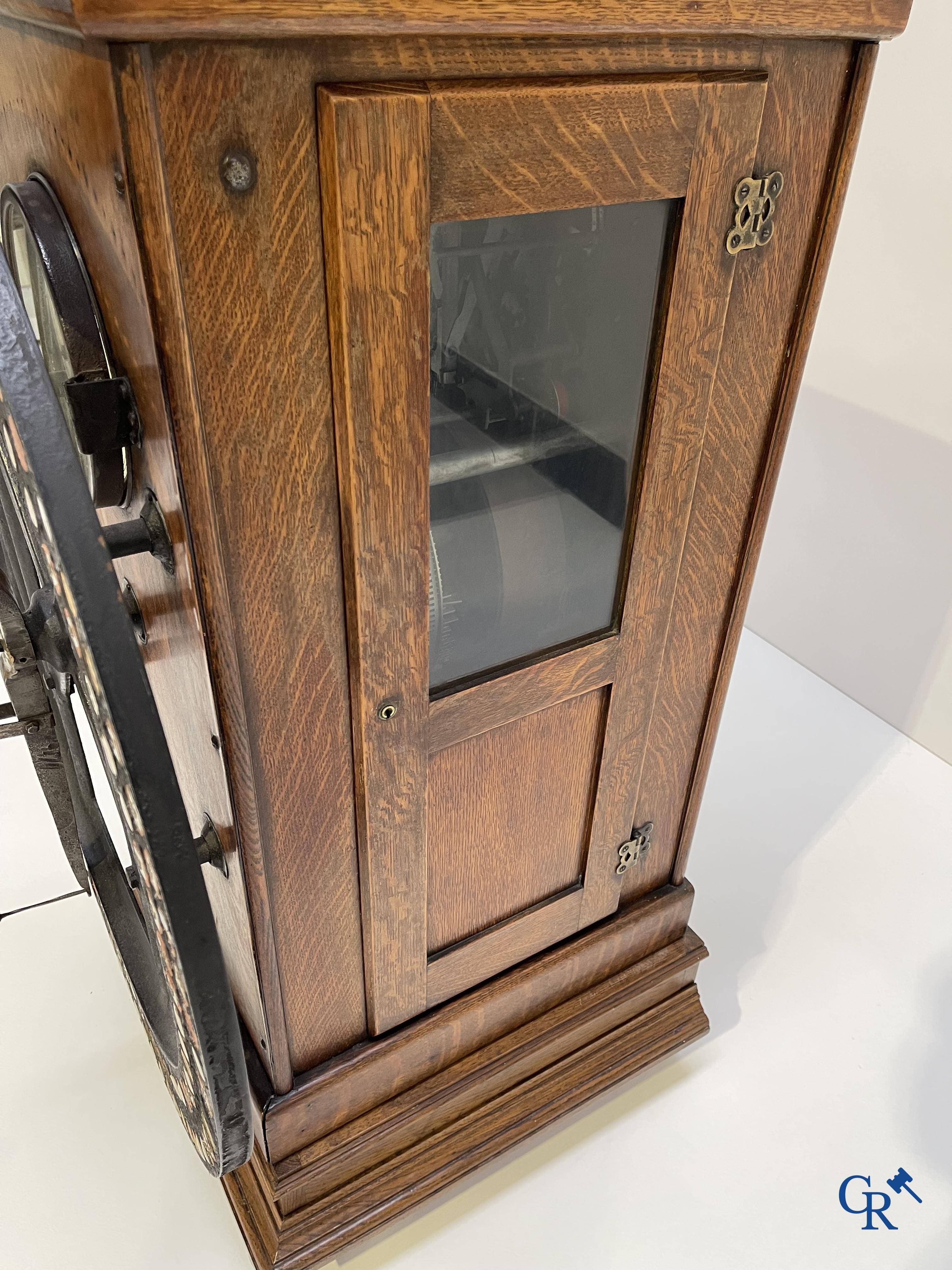 "International" Watson Business Machines Corporation of Belgium. A time clock with cast iron wheel. Circa 1900.