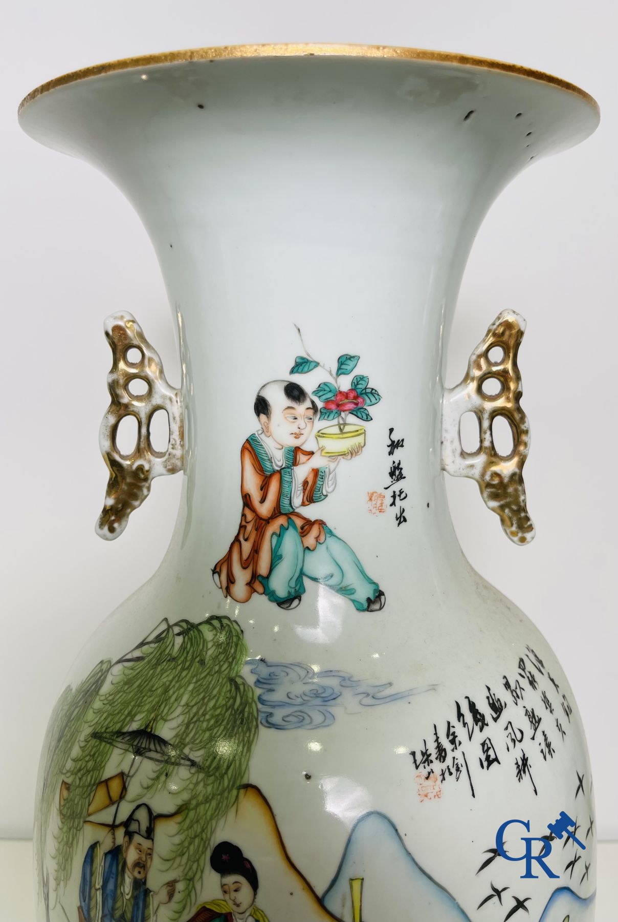 Chinese porcelain: A pair of Chinese vases with a double decor.