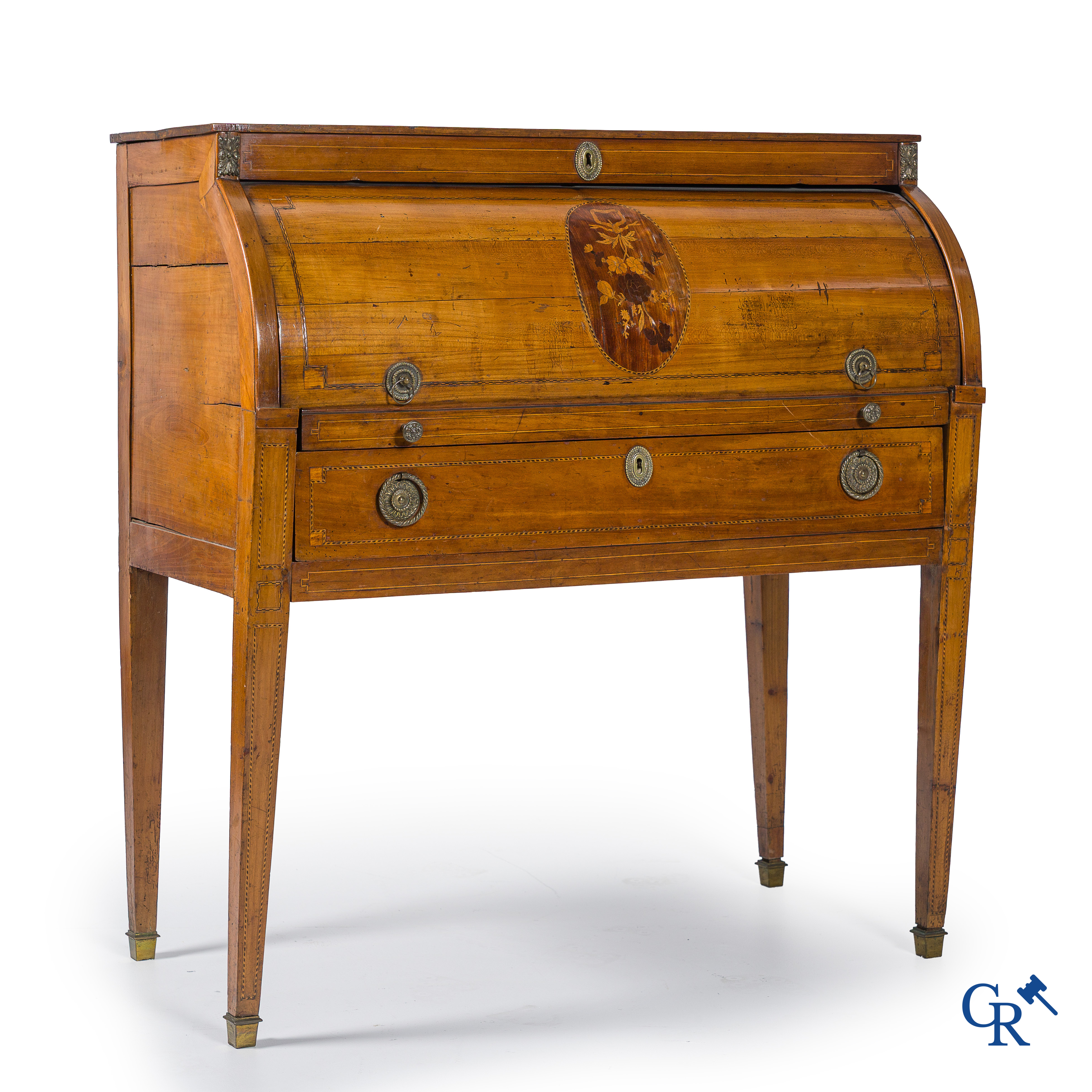 LXVI-period. A ladies cylinder desk in cherrywood and marquetry. France, end of the 18th century.