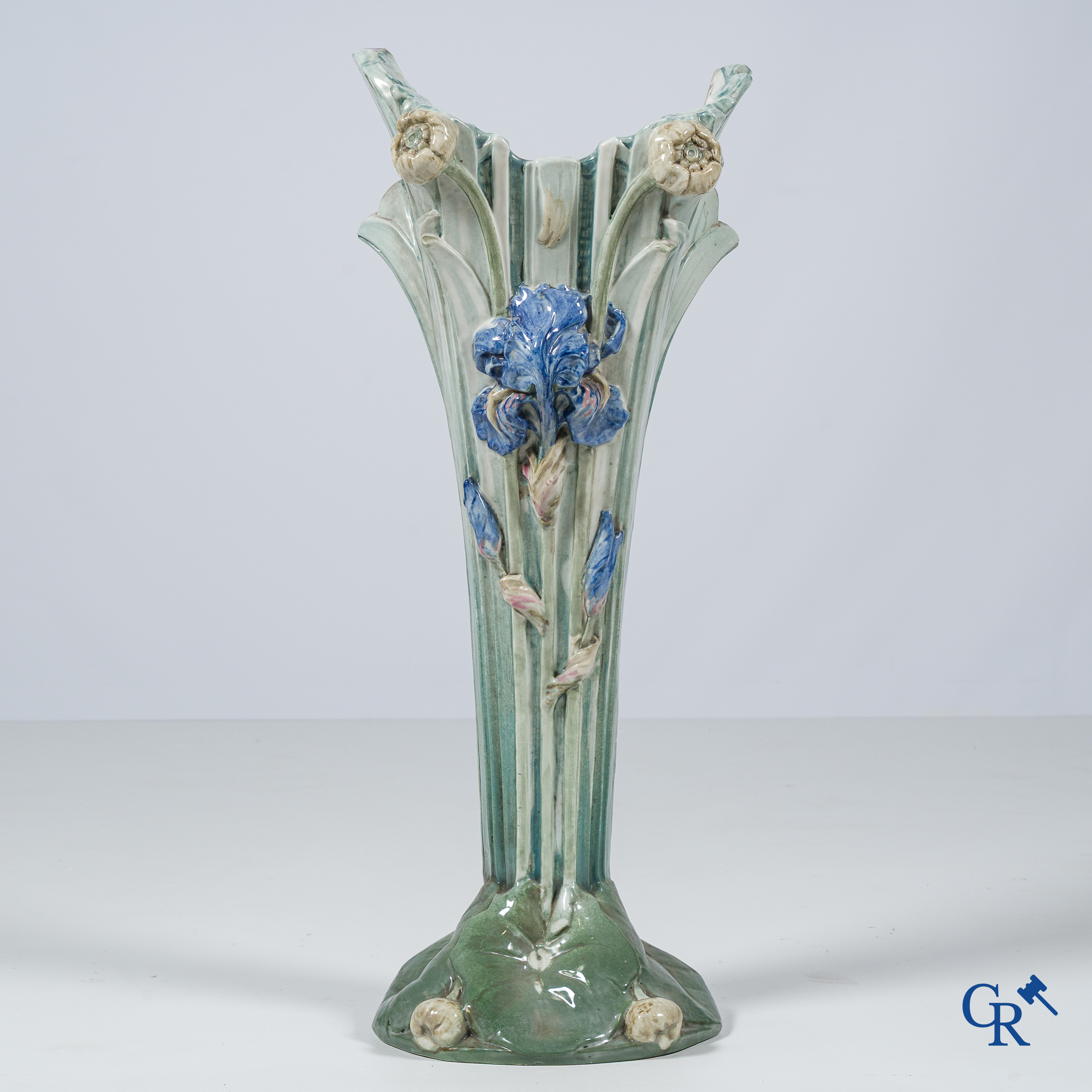 Art Nouveau. Large umbrella holder or corner stand in multi-coloured decorated faience or majolica. Around 1900.