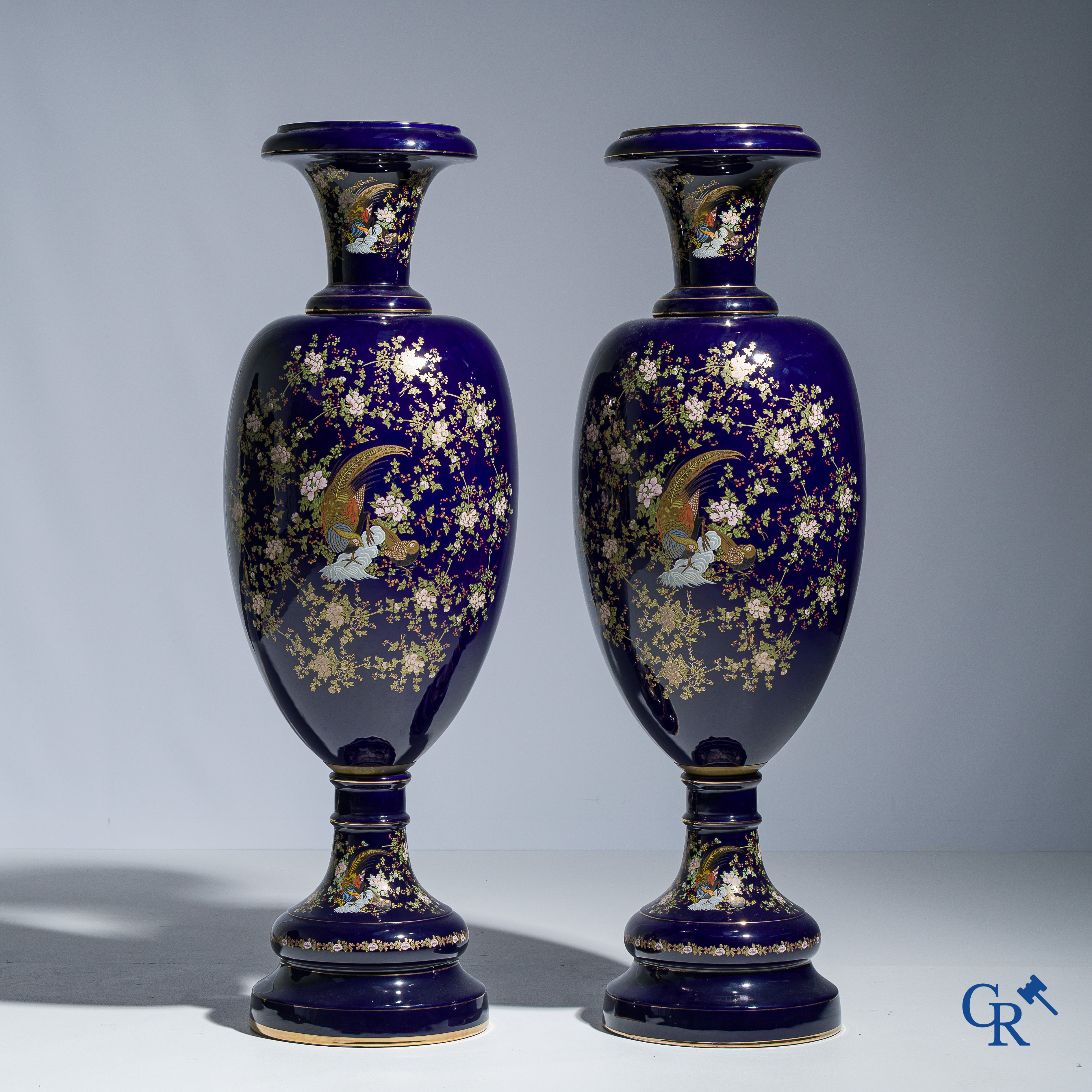 Impressive pair of vases in cobalt blue porcelain. Decor of gold pheasants and flowers. Circa 1950.