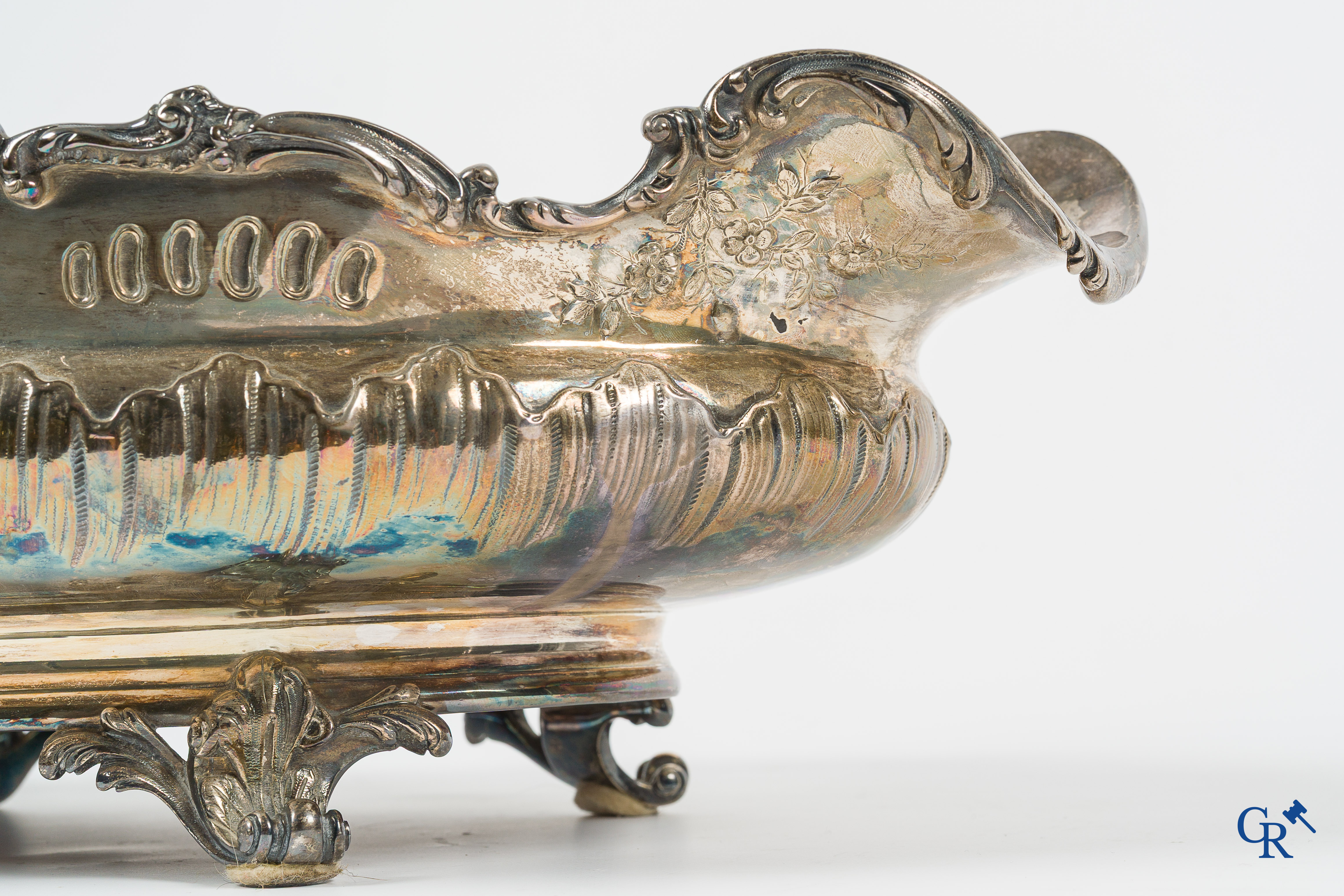 Silver. Decorative center piece or "milieu de table" in silver. Marked with a Minerva head. LXV style.