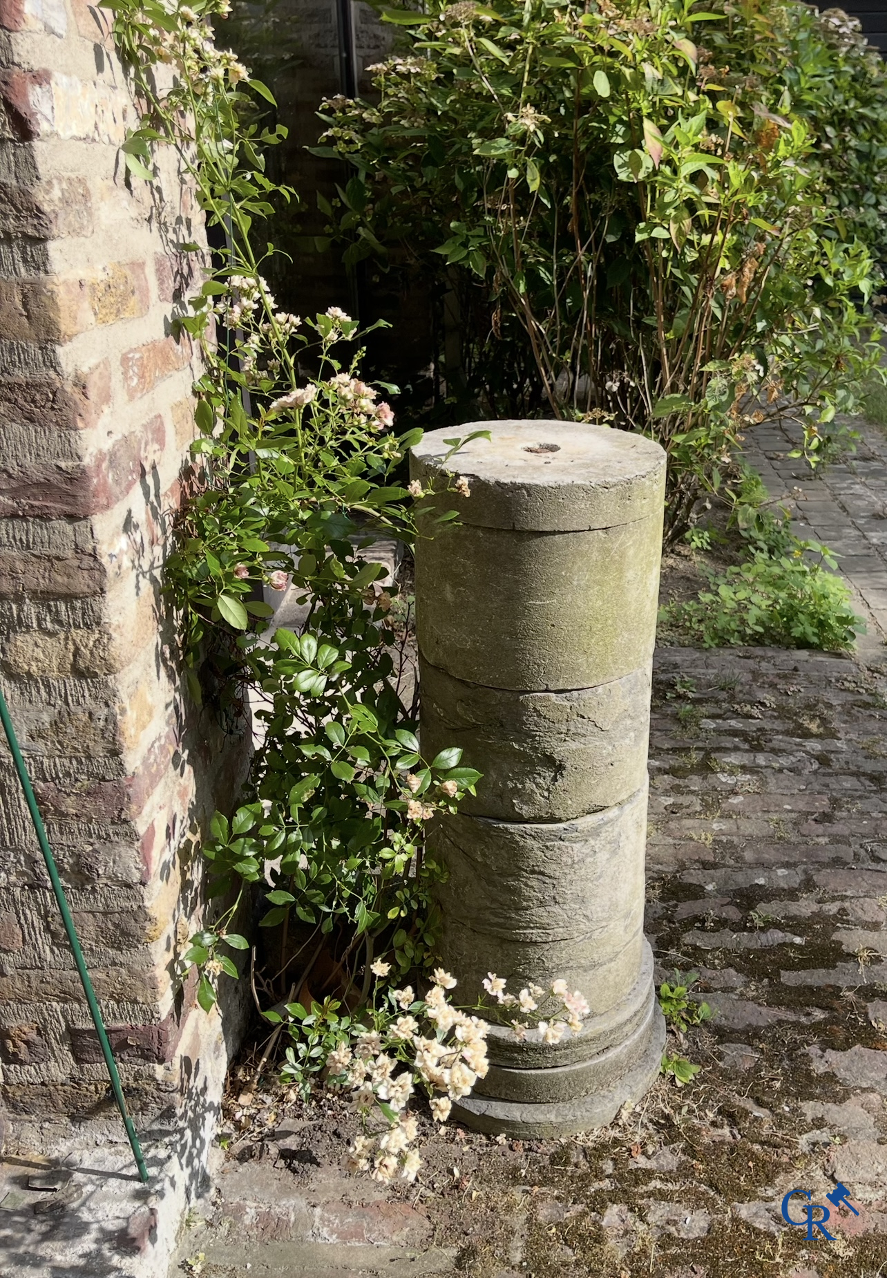 Antique carved architectural ornament in French white stone and a column in stone. 18th century.