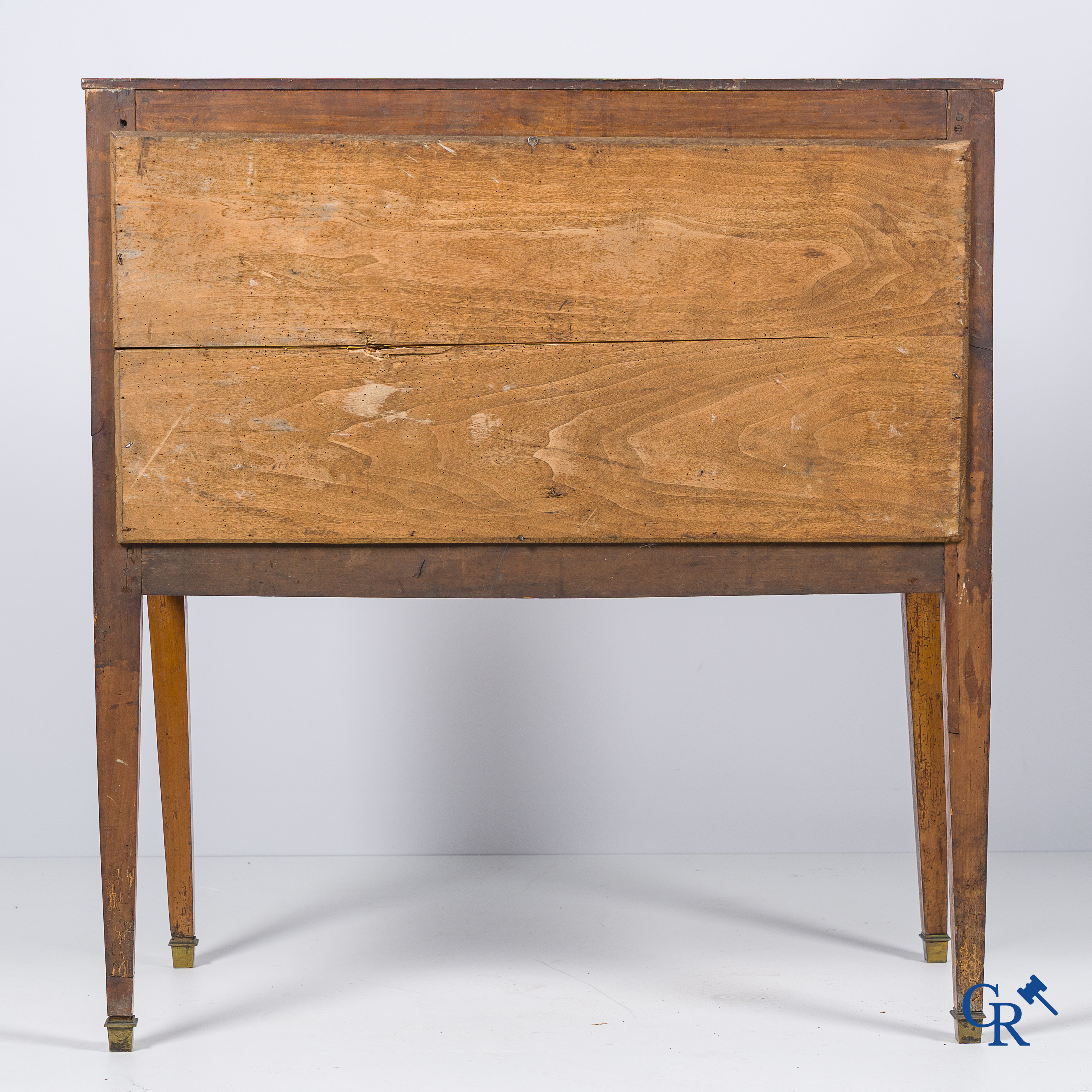 LXVI-period. A ladies cylinder desk in cherrywood and marquetry. France, end of the 18th century.