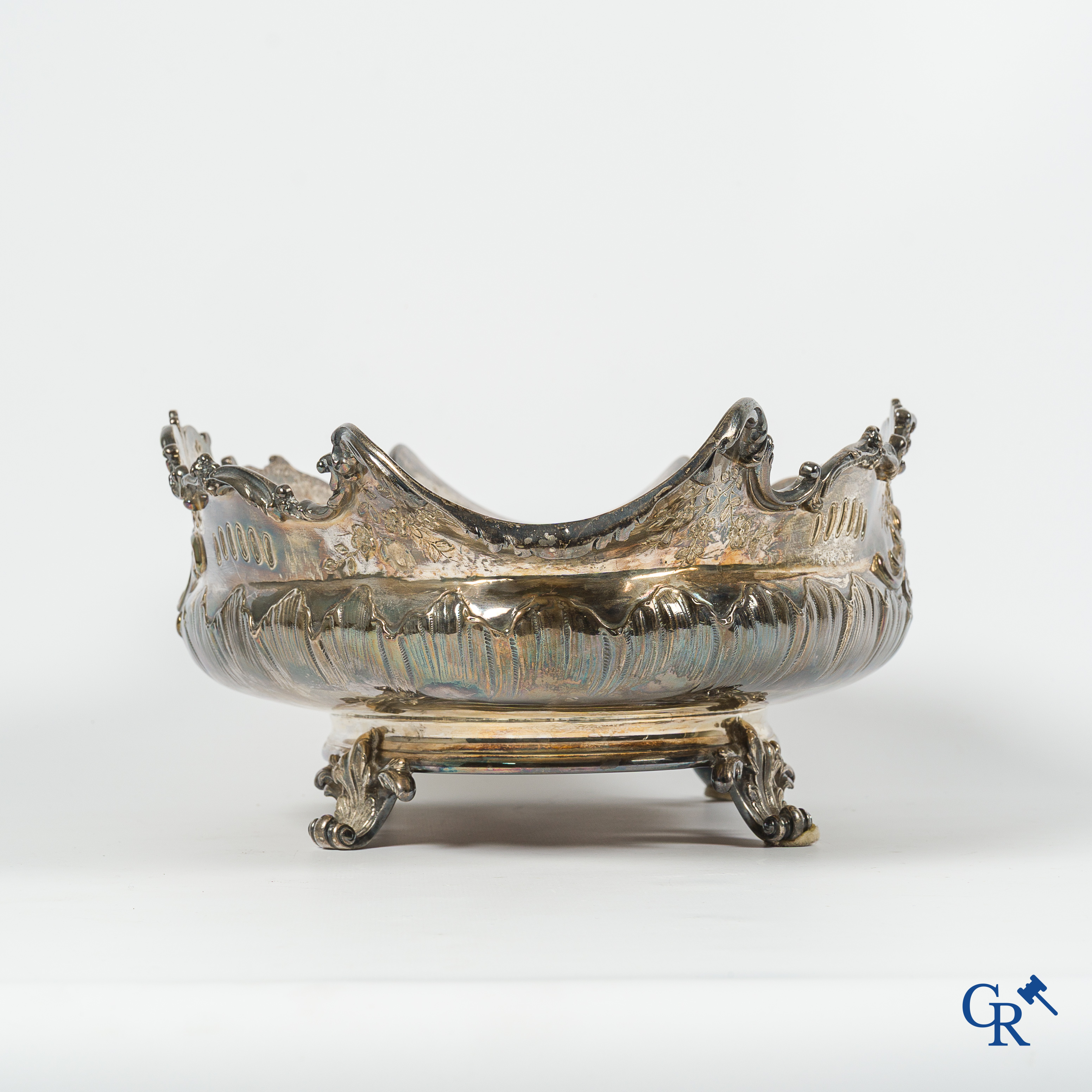 Silver. Decorative center piece or "milieu de table" in silver. Marked with a Minerva head. LXV style.