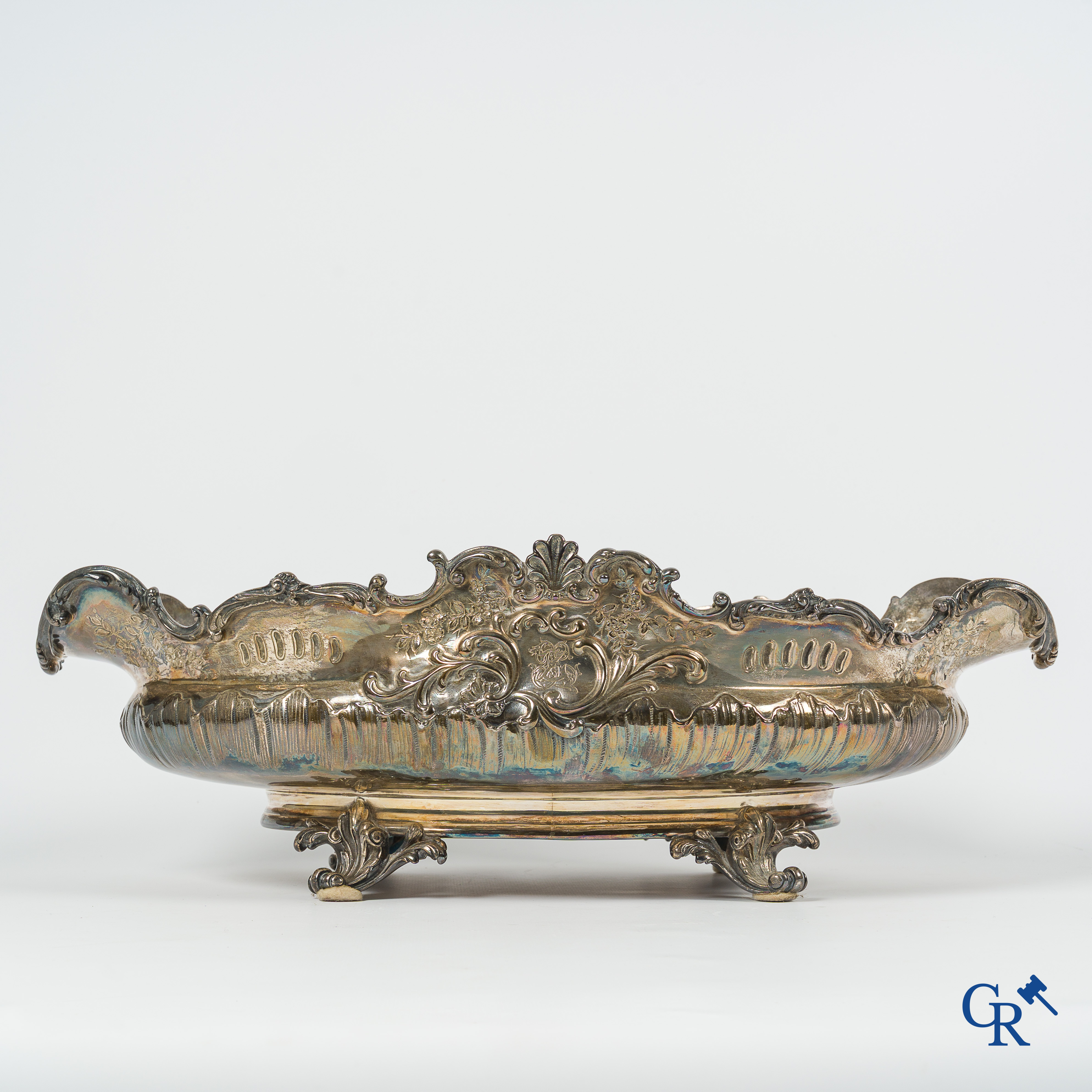 Silver. Decorative center piece or "milieu de table" in silver. Marked with a Minerva head. LXV style.