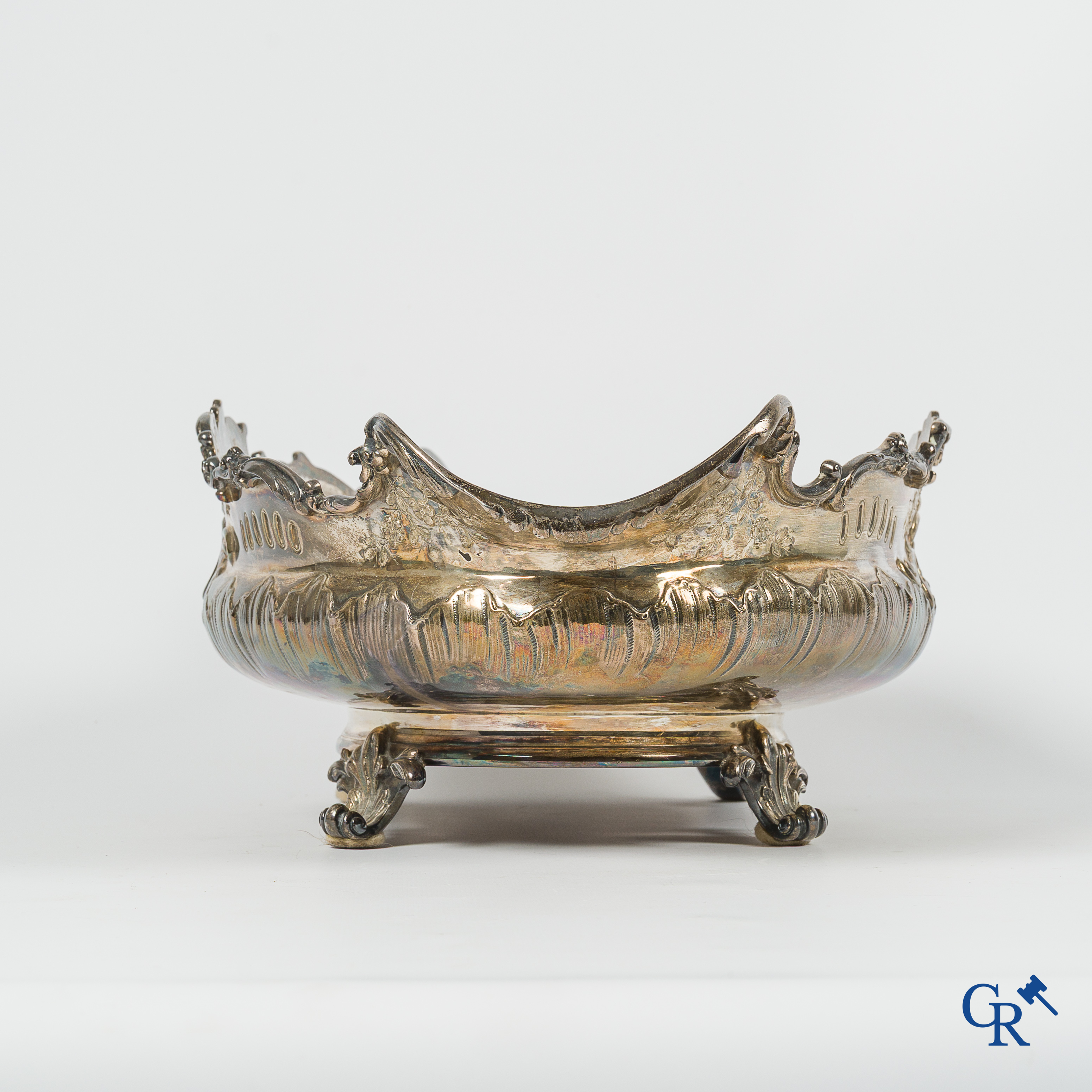 Silver. Decorative center piece or "milieu de table" in silver. Marked with a Minerva head. LXV style.