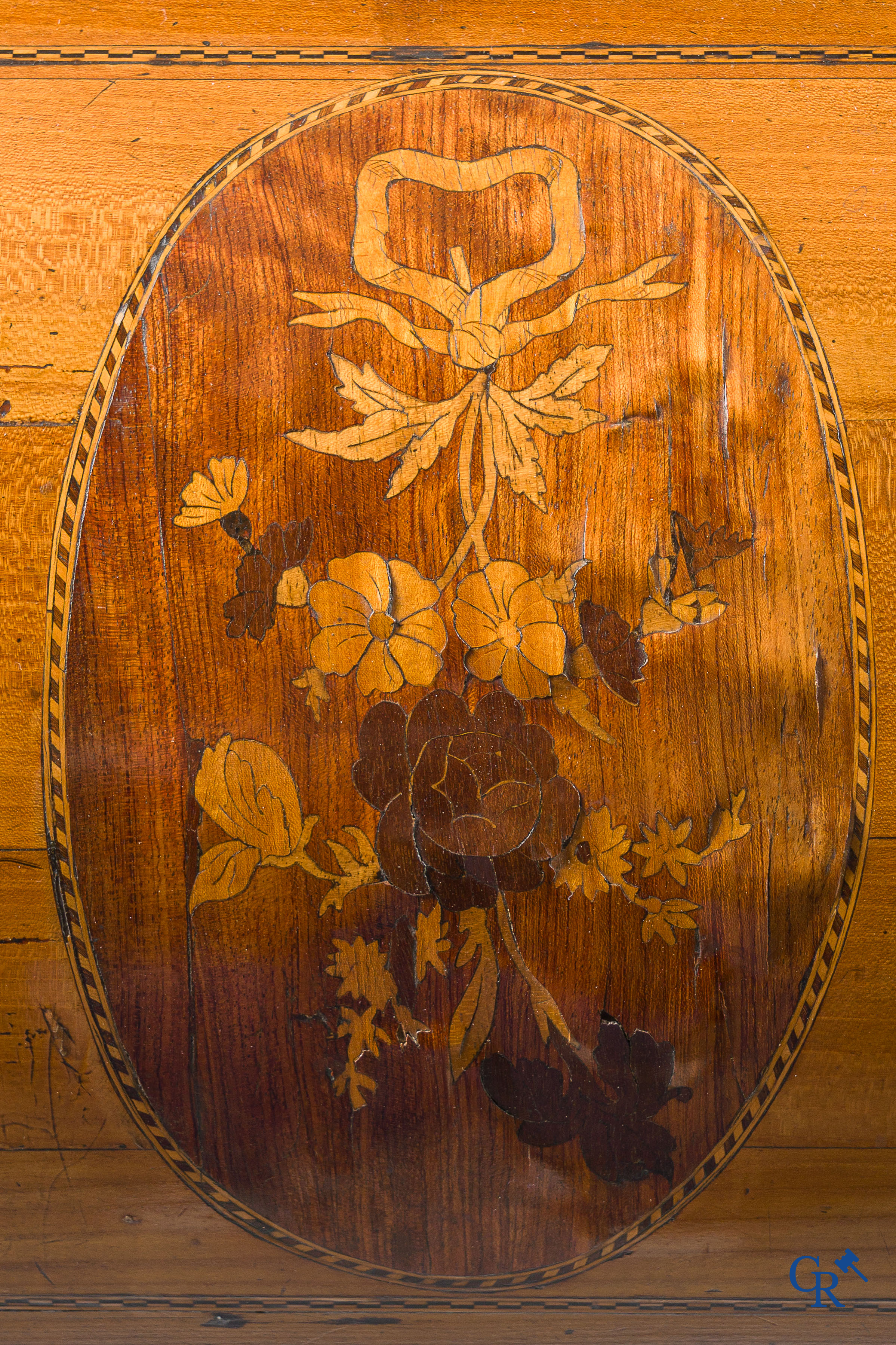 LXVI-period. A ladies cylinder desk in cherrywood and marquetry. France, end of the 18th century.