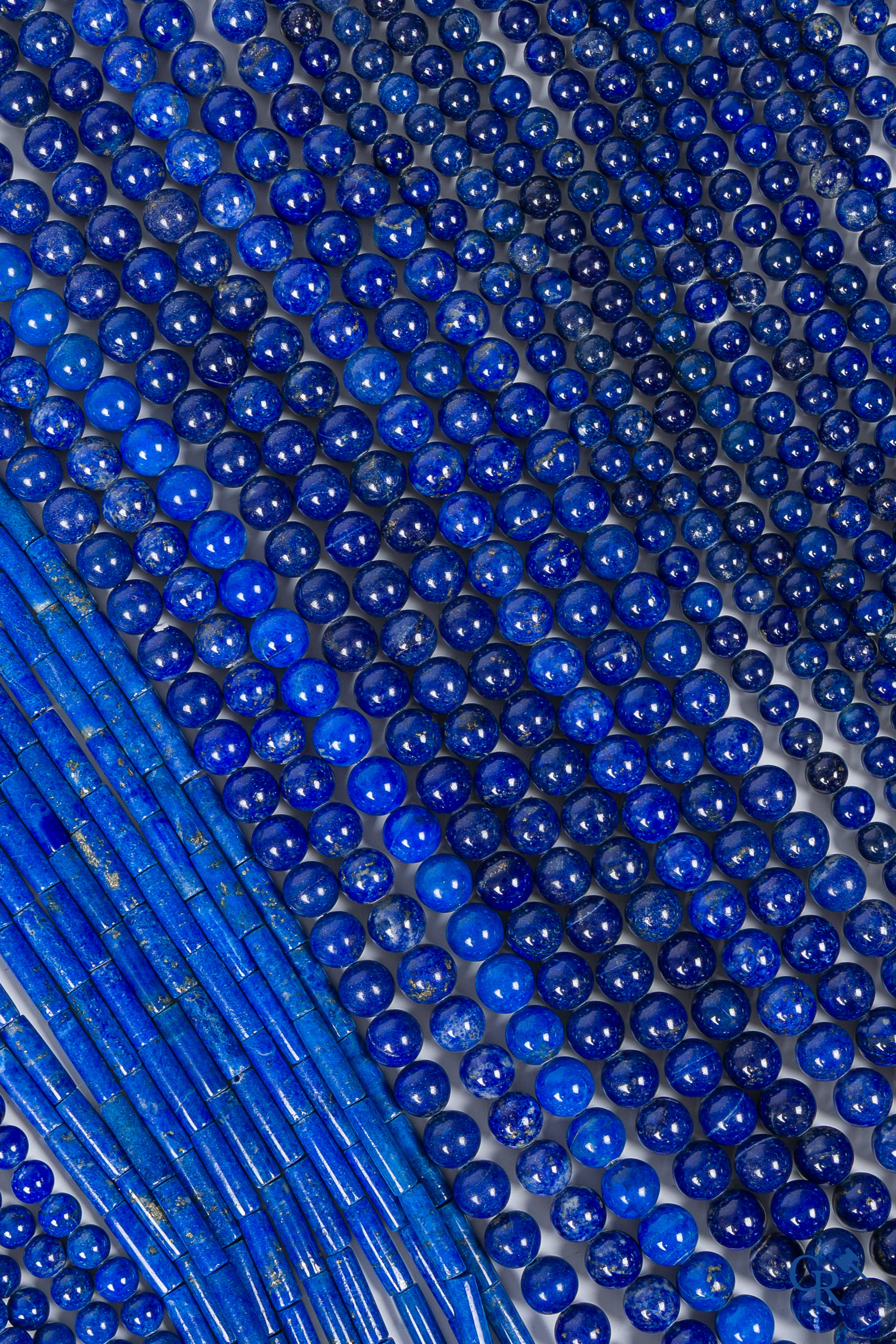 Juwelen. Groot lot met Lapis Lazulli parels.
