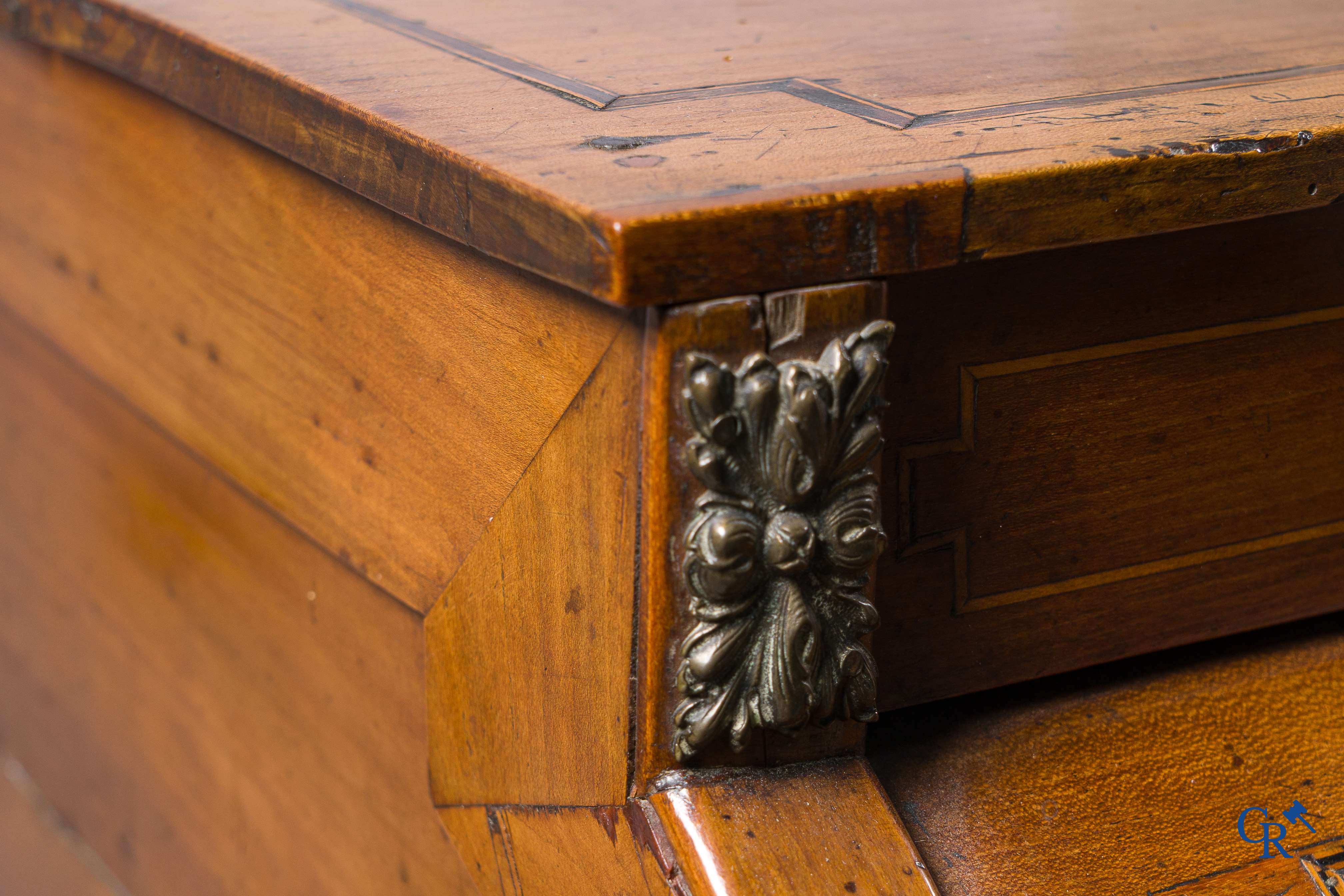 LXVI-period. A ladies cylinder desk in cherrywood and marquetry. France, end of the 18th century.