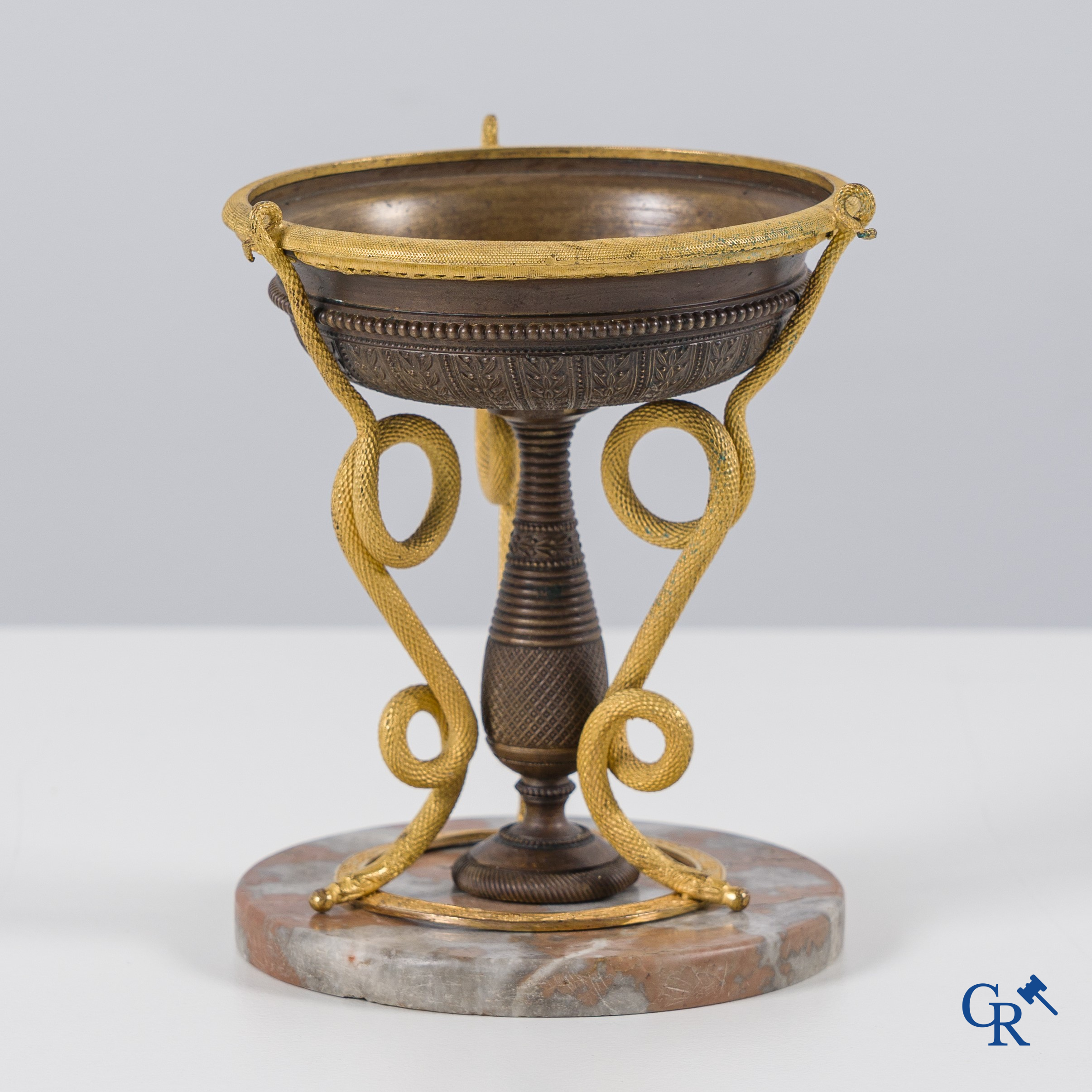 Restoration Period: Tazza with decorations of snakes in gilded and patinated bronze.