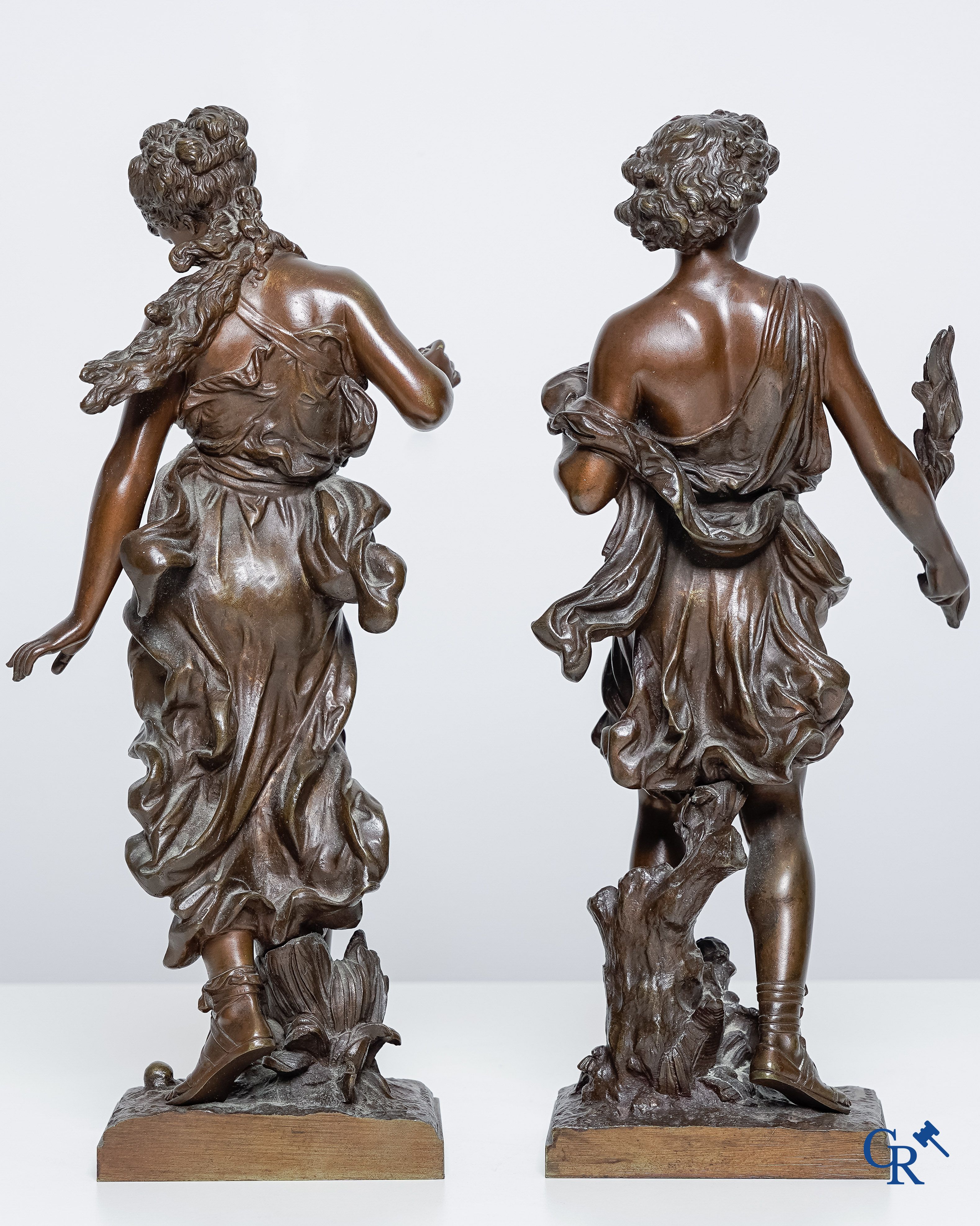 Hippolyte Moreau (1832-1927) Hippomène and Atalante. Pair of bronze statues with brown patina.