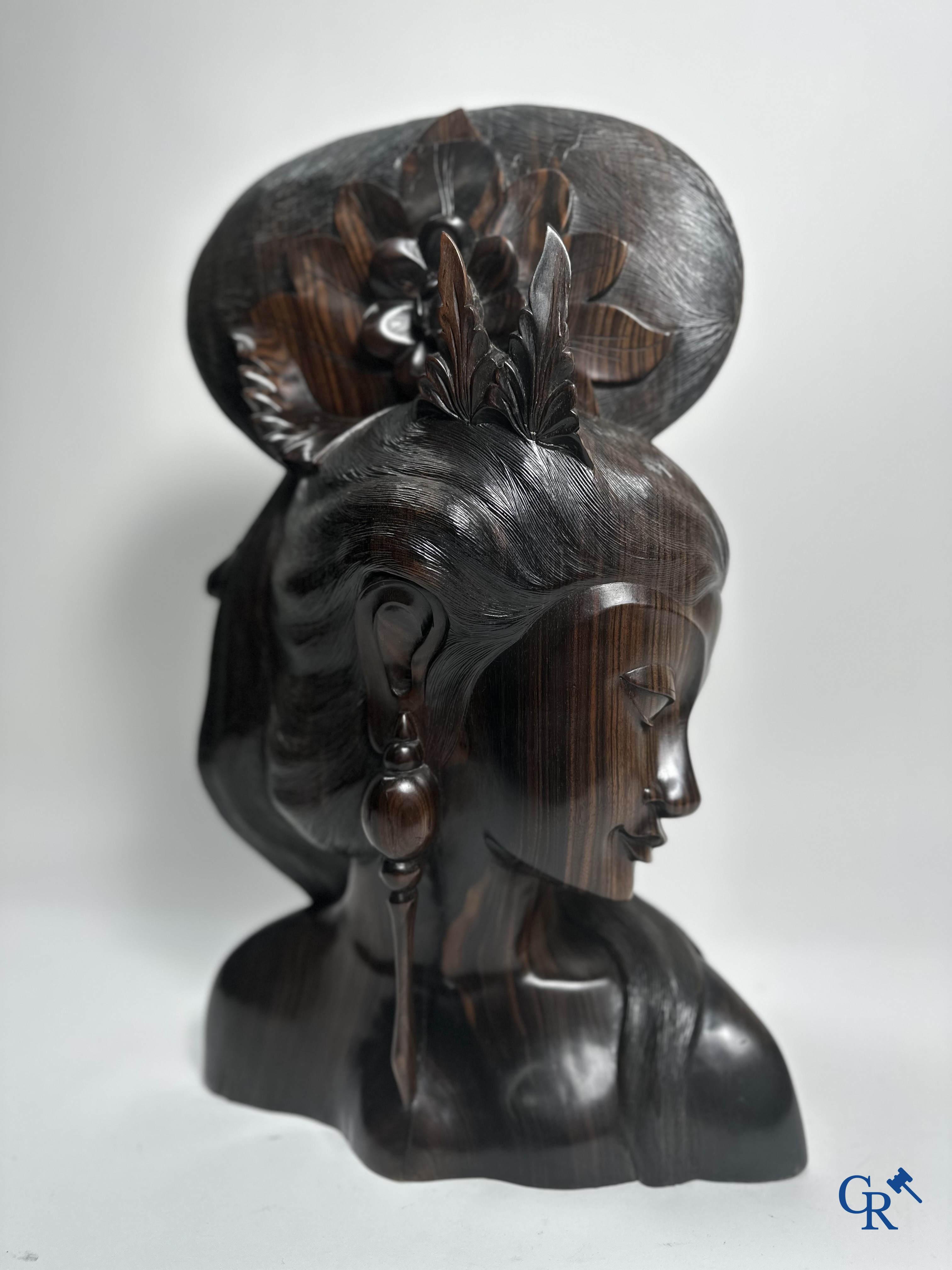 Indonesia: Imposing sculpture in exotic hardwood from a Javanese beauty.