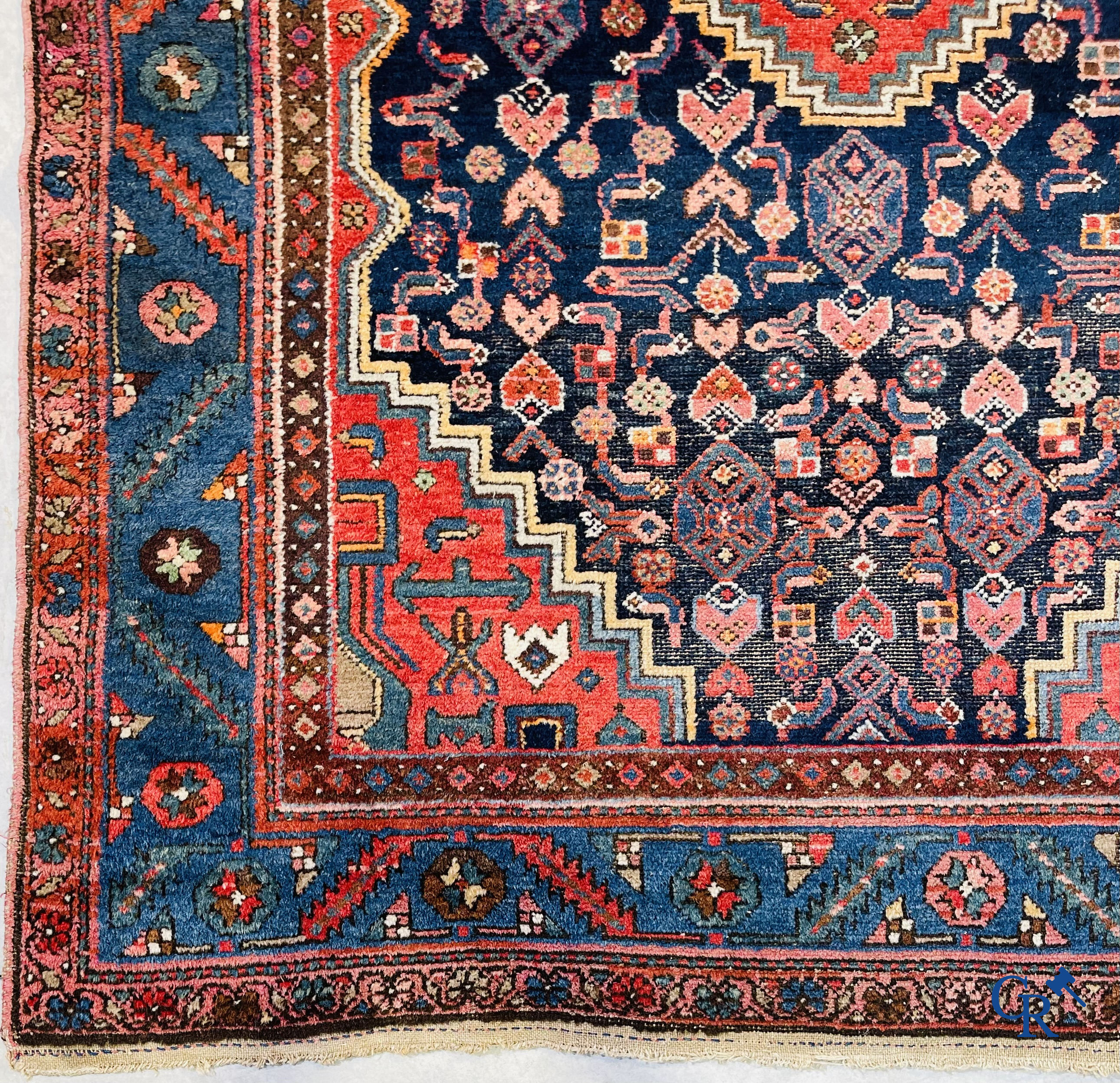 Oriental carpets, 2 antique hand-knotted Oriental carpets.