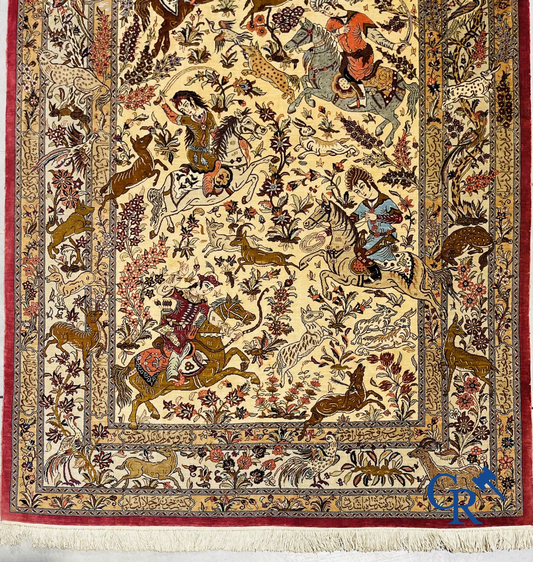 Oriental carpets: Iran, Ghoum. Signed Persian carpet in silk with a hunting decor.