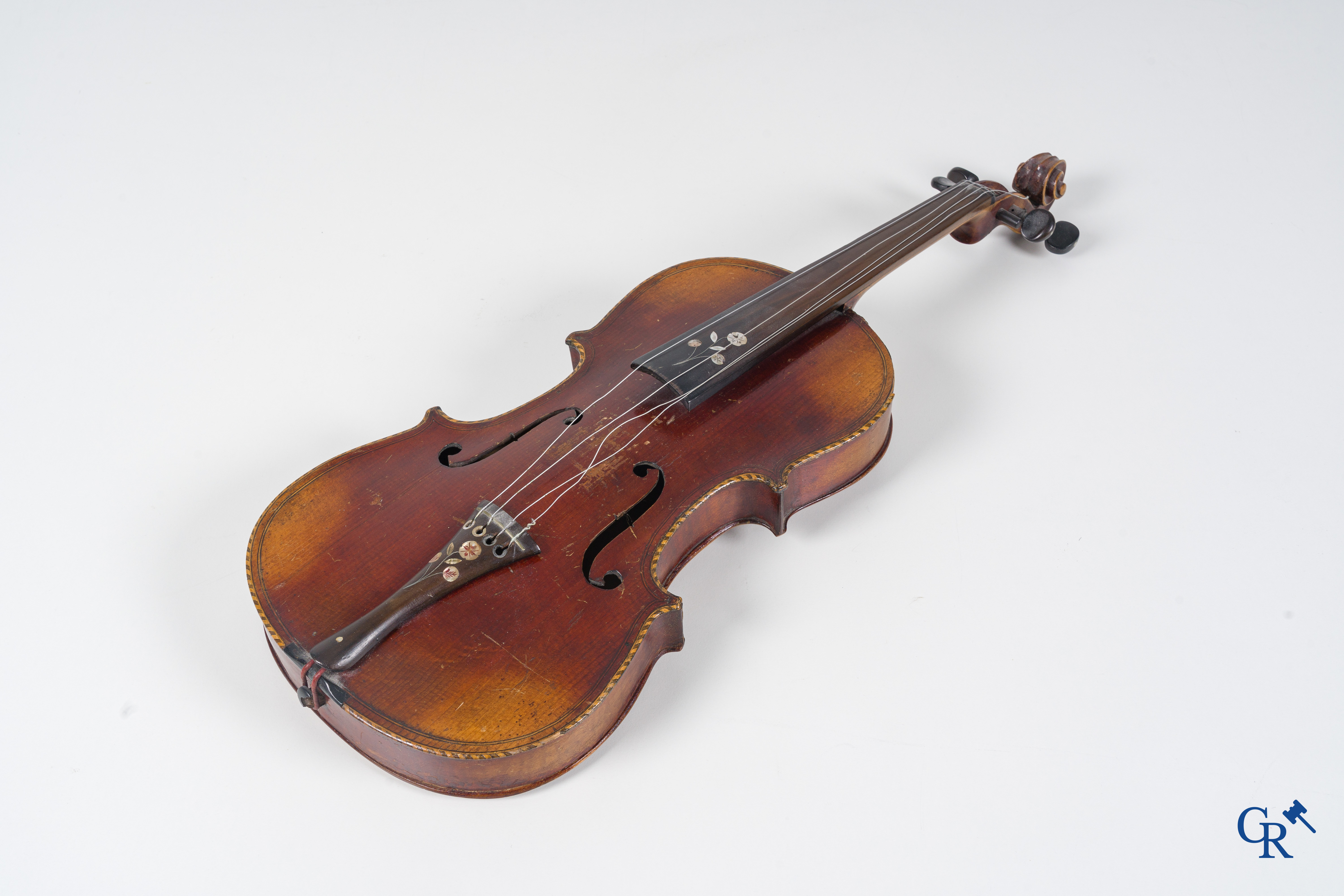 Musical instrument: Violin decorated with mother-of-pearl.