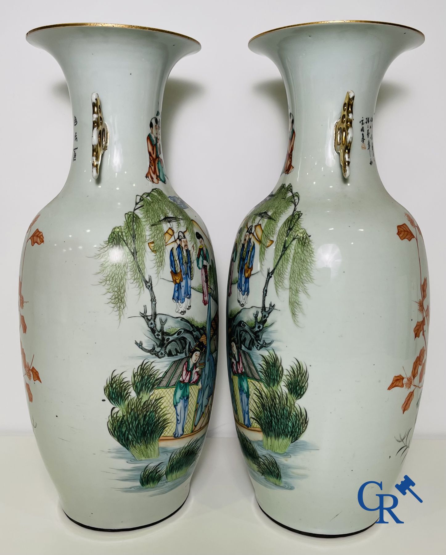 Chinese porcelain: A pair of Chinese vases with a double decor.