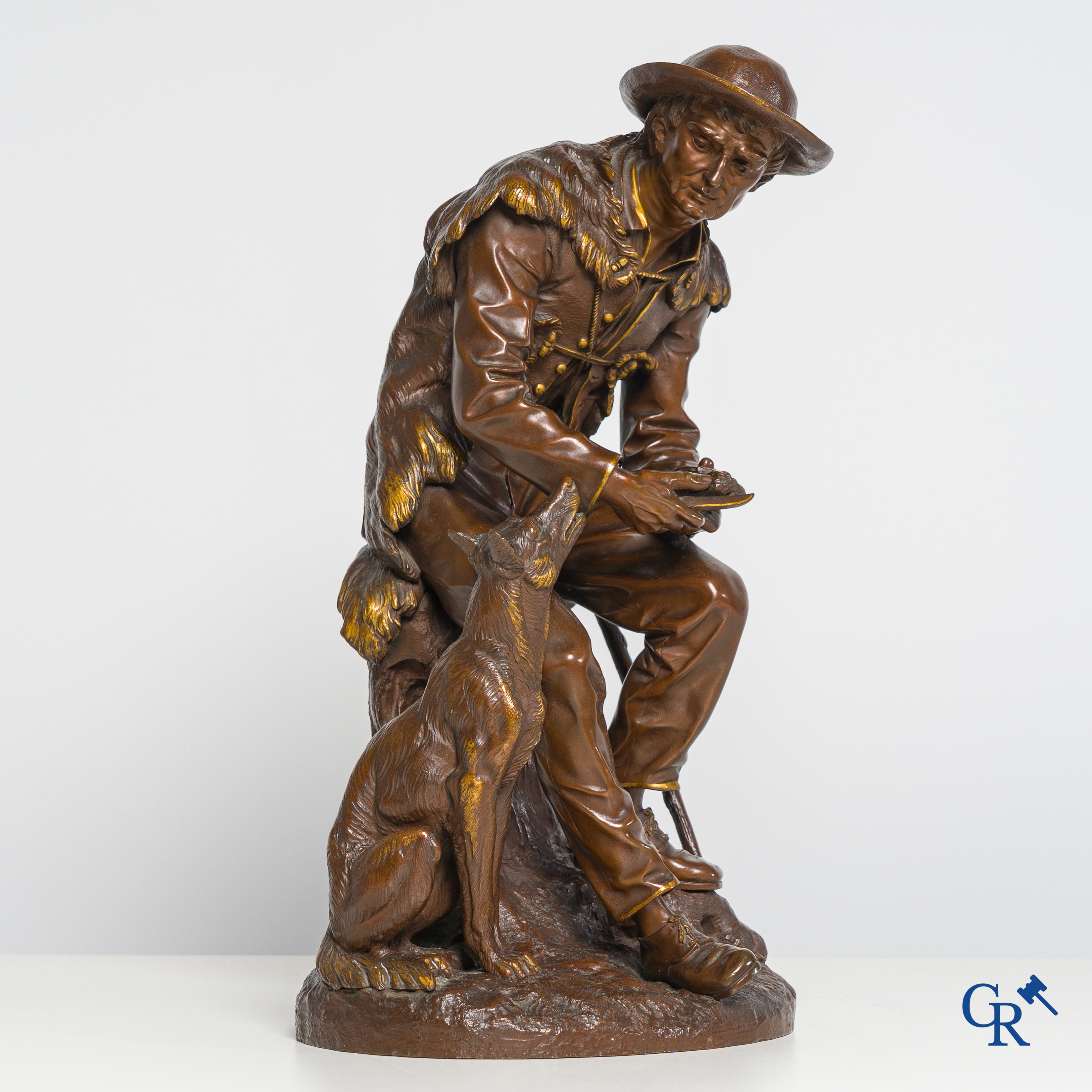 Anatole J. Guillot (1865-1911) Bronze statue with brown and gilded patina. Shepherd with dog.