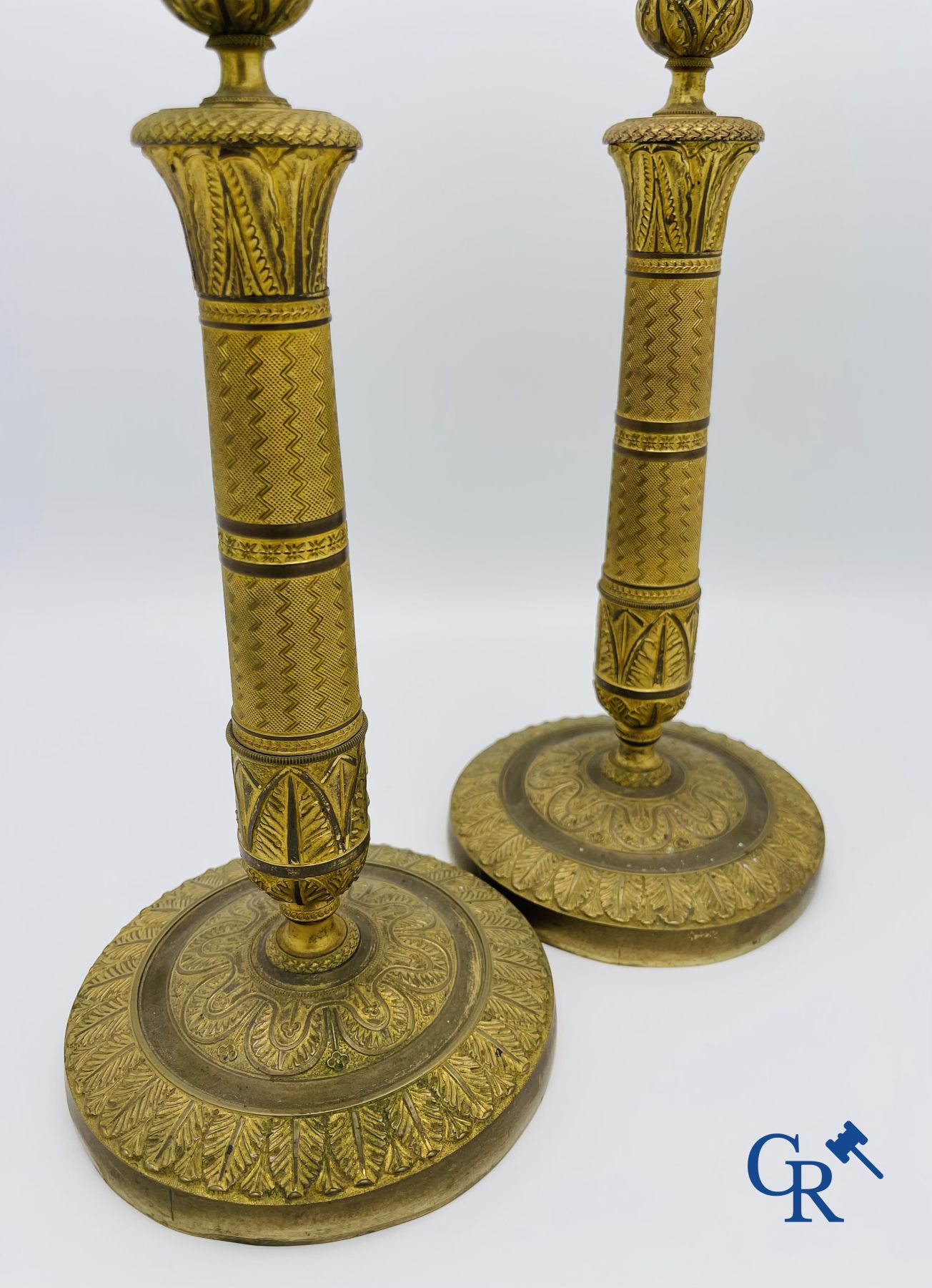 Pair of Charles X candlesticks in gilded bronze.