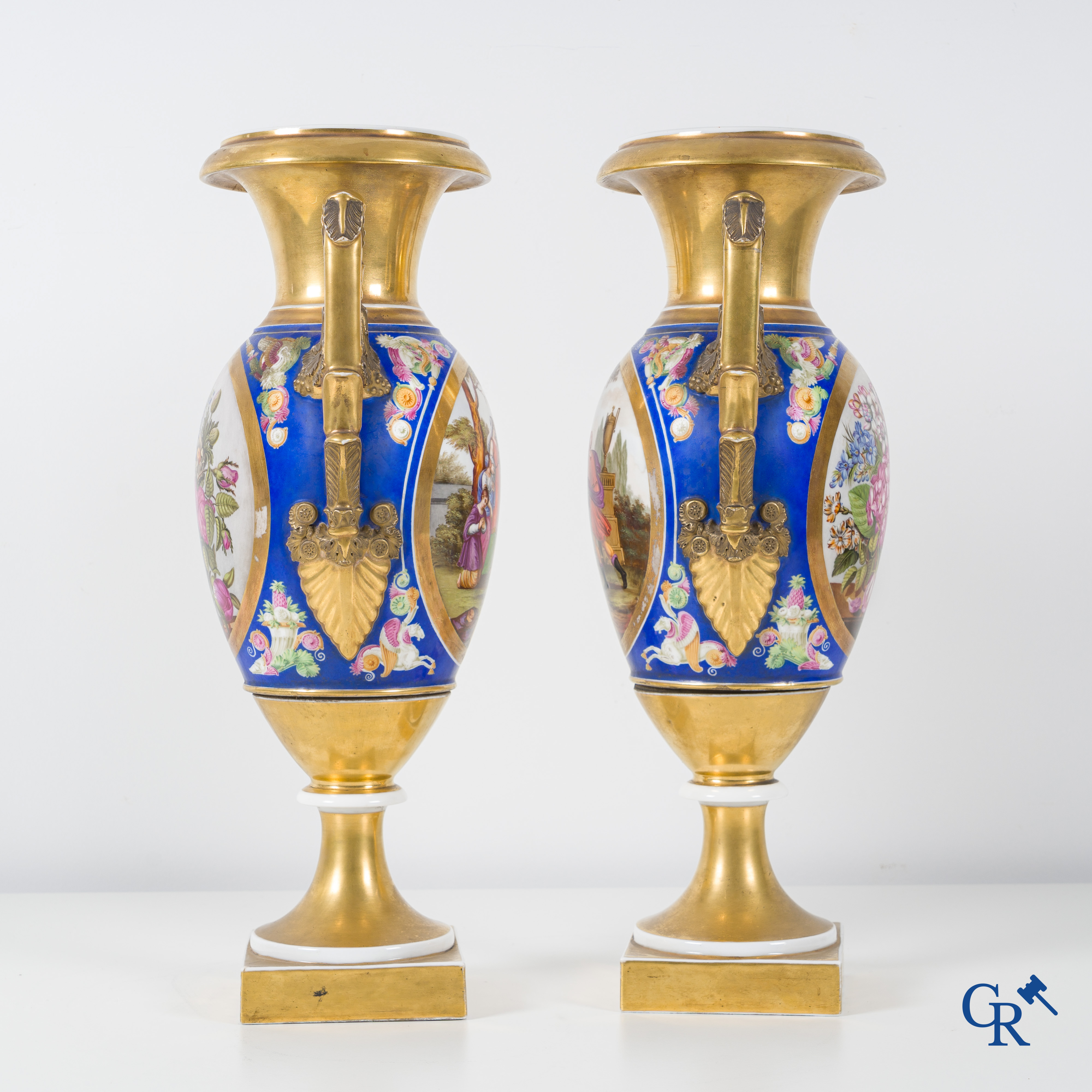 Empire, a pair of imposing multicolored decorated and gilded vases. Early 19th century.