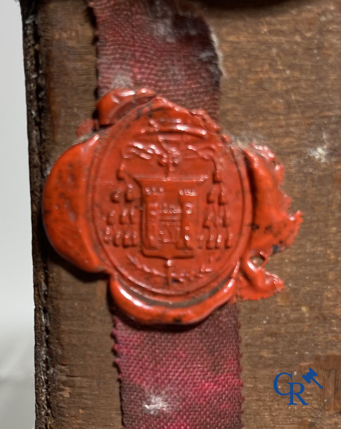 An antique wooden reliquary sealed with wax seals. Early 19th century.