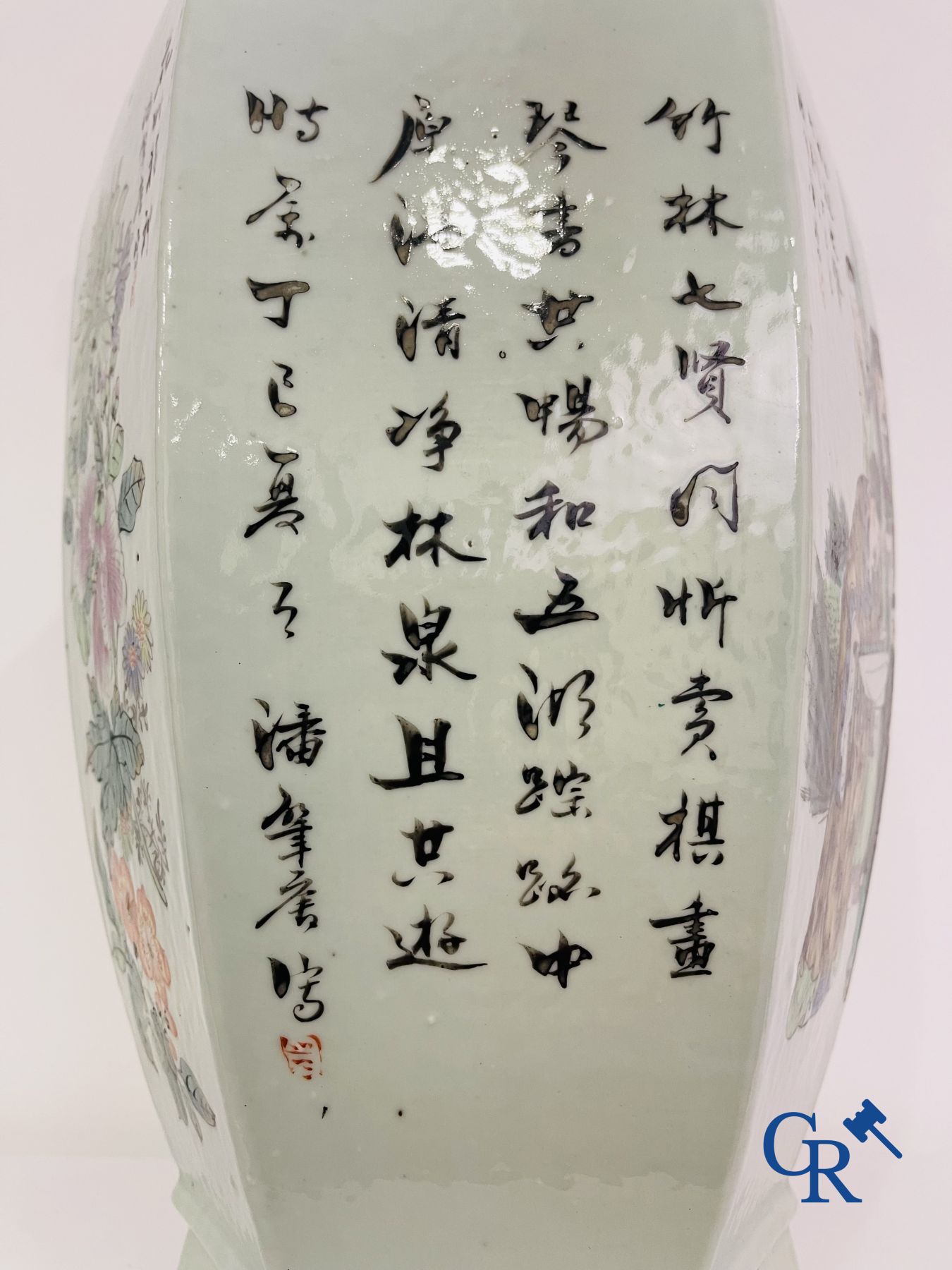 Asian Art: Chinese porcelain. A hexagonal Chinese Famille rose vase with sages and scholars. 19/20th century.