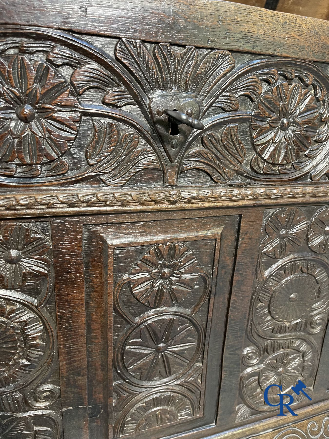 Furniture: Large sculpted oak chest. England, dated 1810.