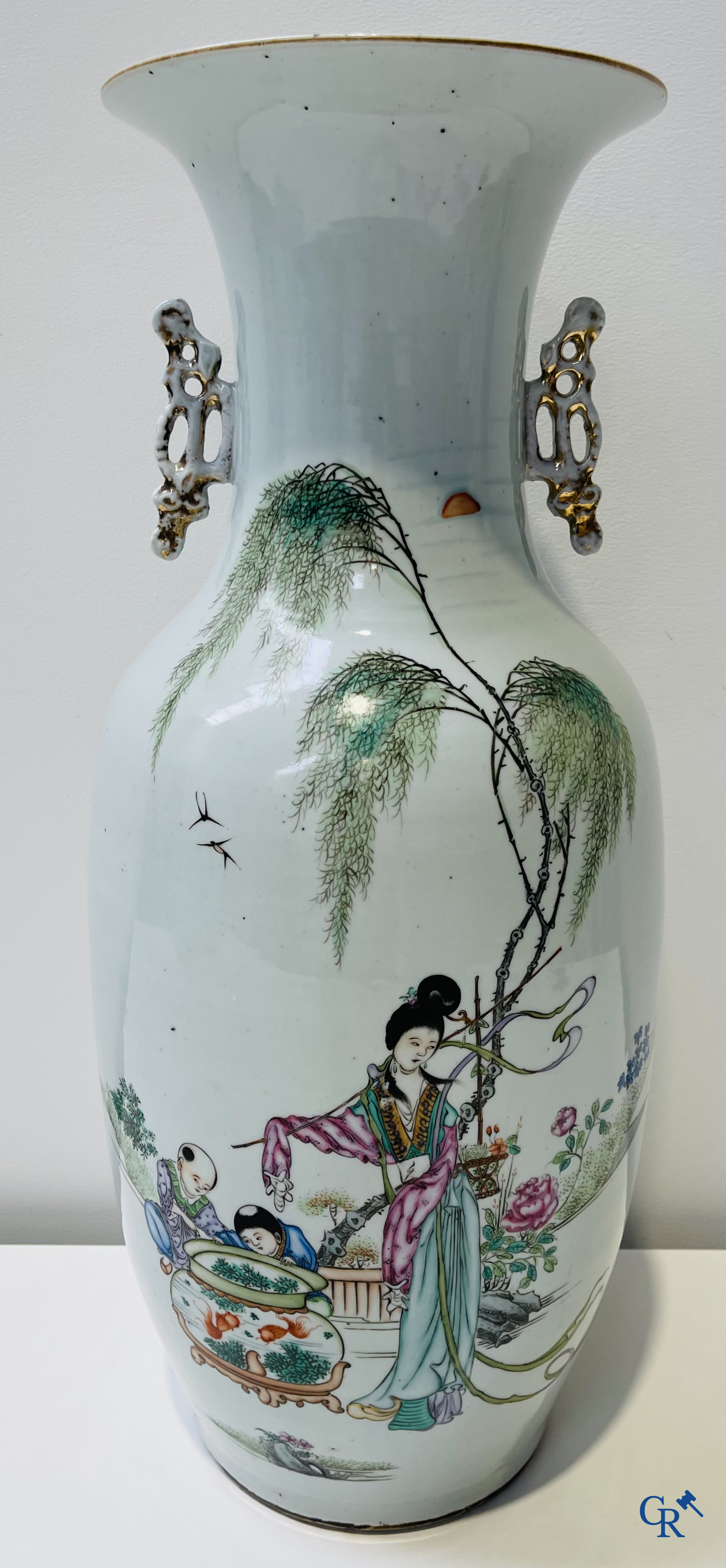 Asian Art: Chinese porcelain, Chinese vase depicting a lady and children playing around an aquarium.