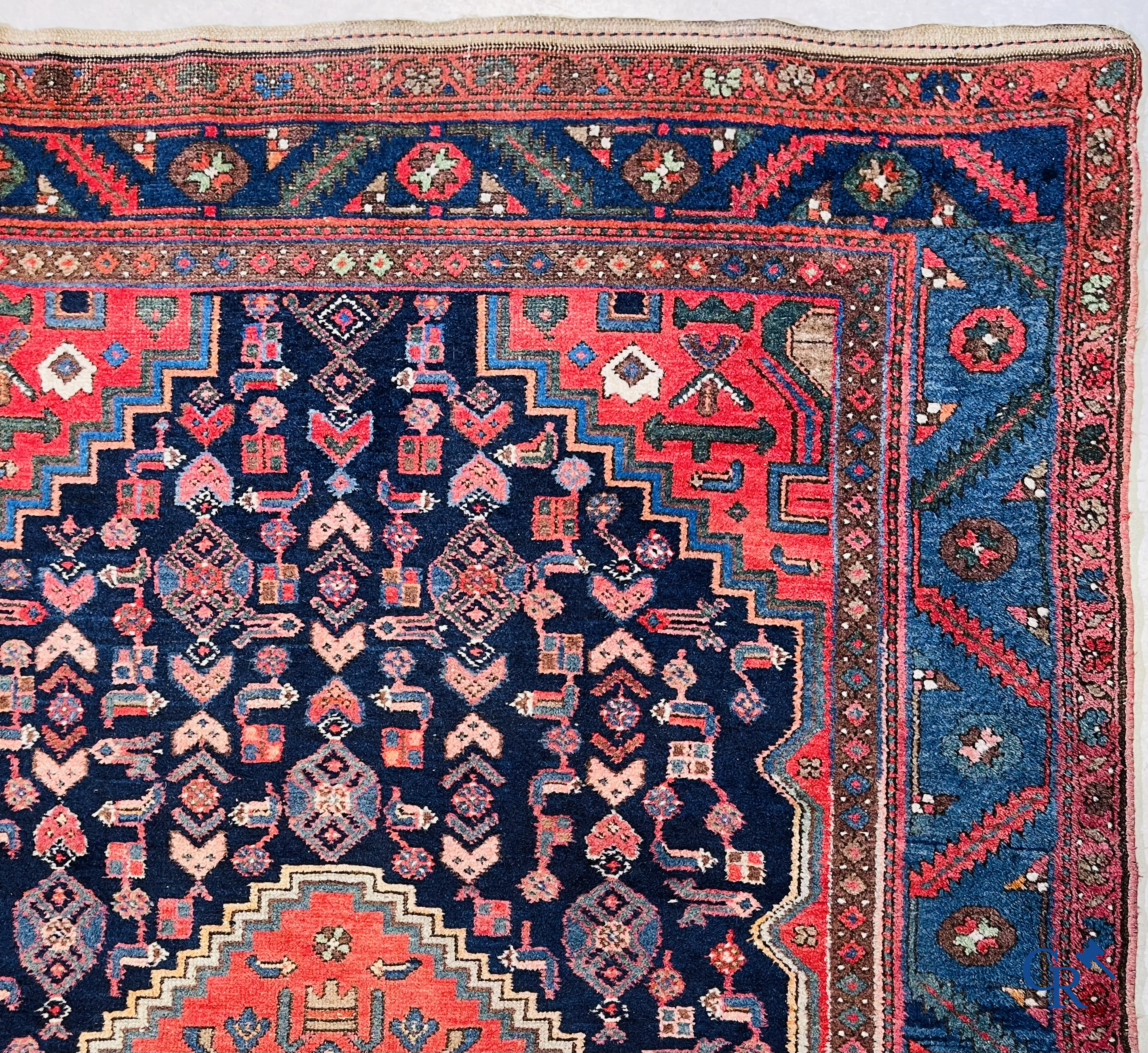 Oriental carpets, 2 antique hand-knotted Oriental carpets.